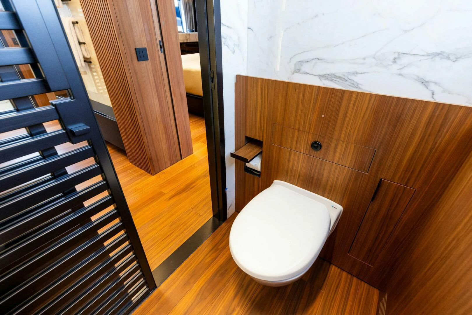 a toilet in a bathroom aboard KAMAKASA Yacht for Sale