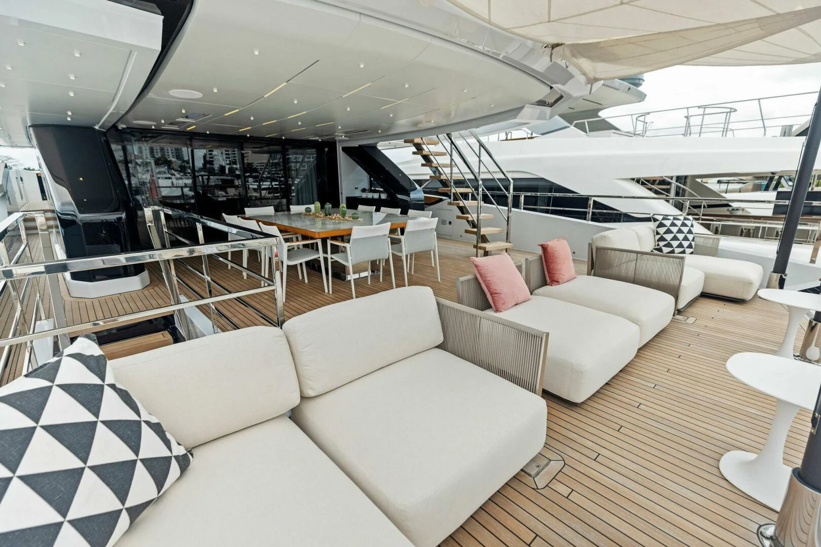 a room with couches and tables aboard KAMAKASA Yacht for Sale