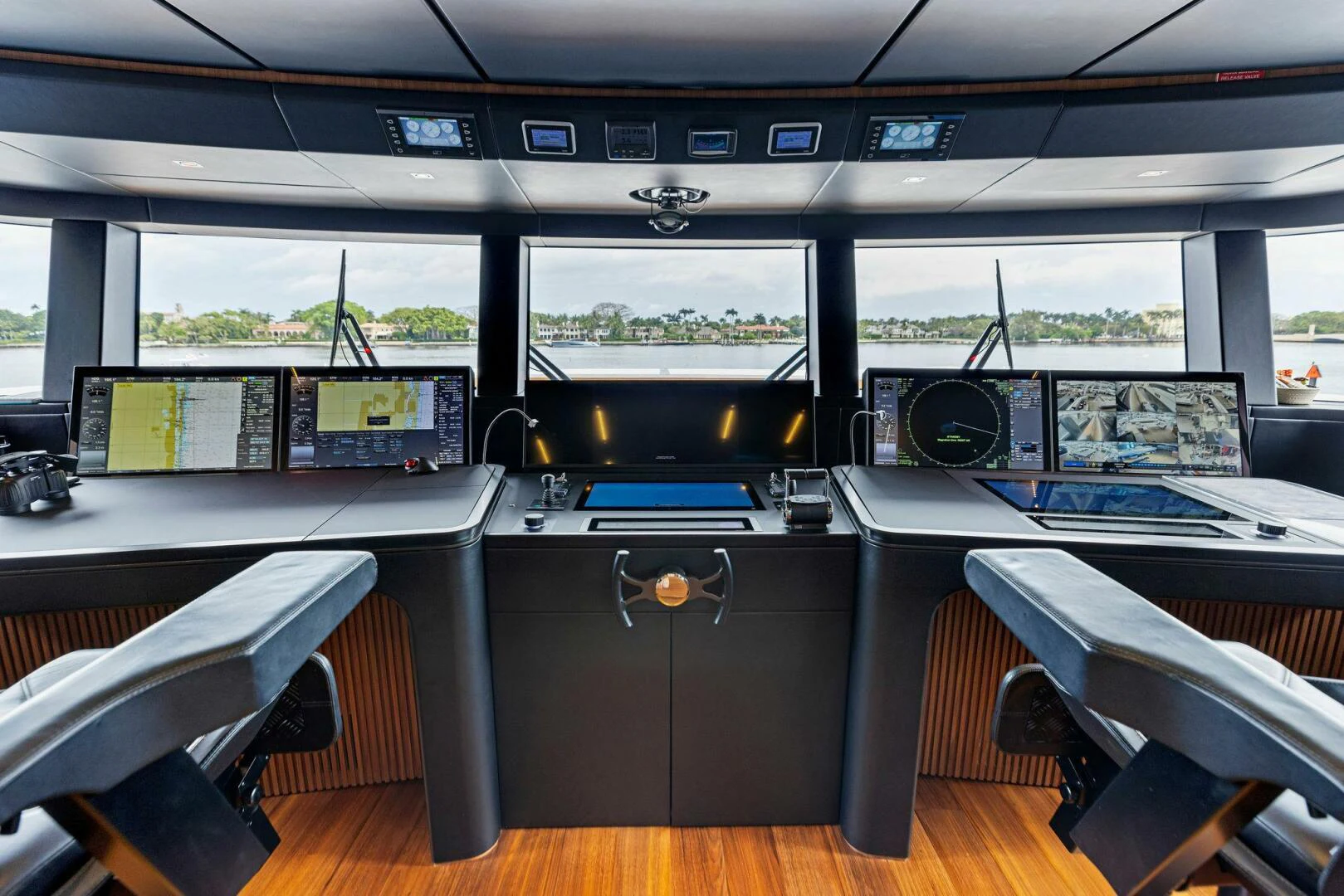 a room with a desk and computer aboard KAMAKASA Yacht for Sale