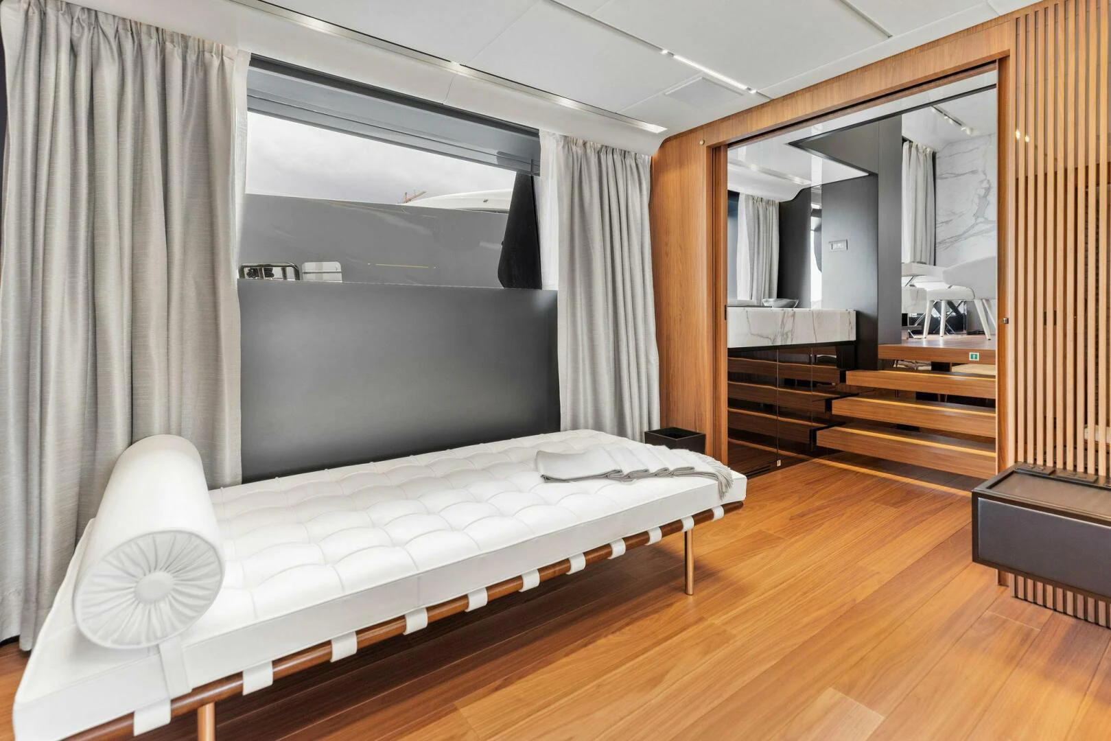 a bedroom with a large bed aboard KAMAKASA Yacht for Sale