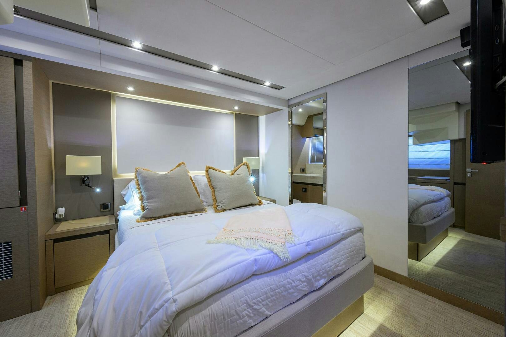 a bed in a room aboard 2016 68 PRESTIGE Yacht for Sale