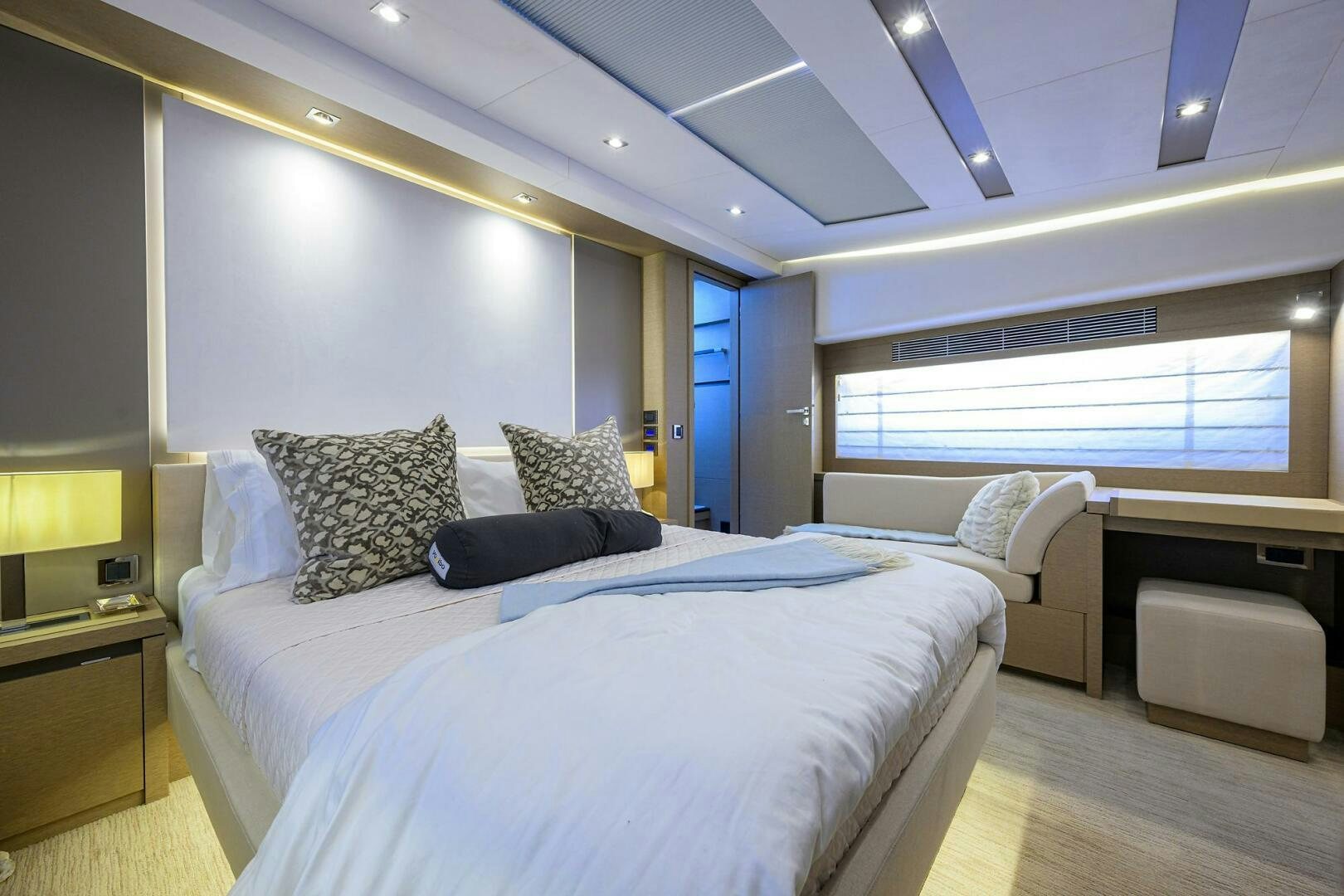 a room with two beds aboard 2016 68 PRESTIGE Yacht for Sale