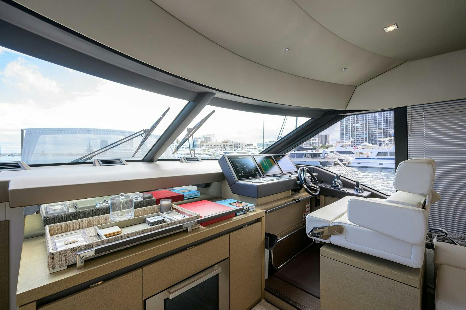 a room with a desk and a bed aboard 2016 68 PRESTIGE Yacht for Sale