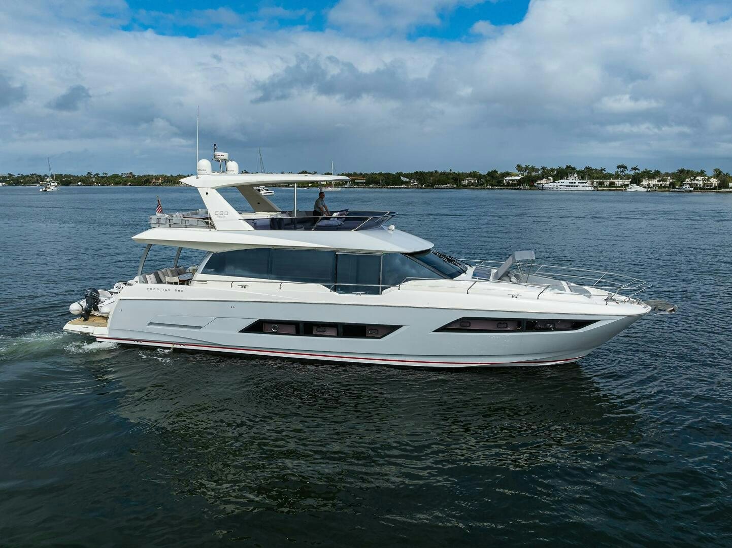 a white yacht on the water aboard 2016 68 PRESTIGE Yacht for Sale