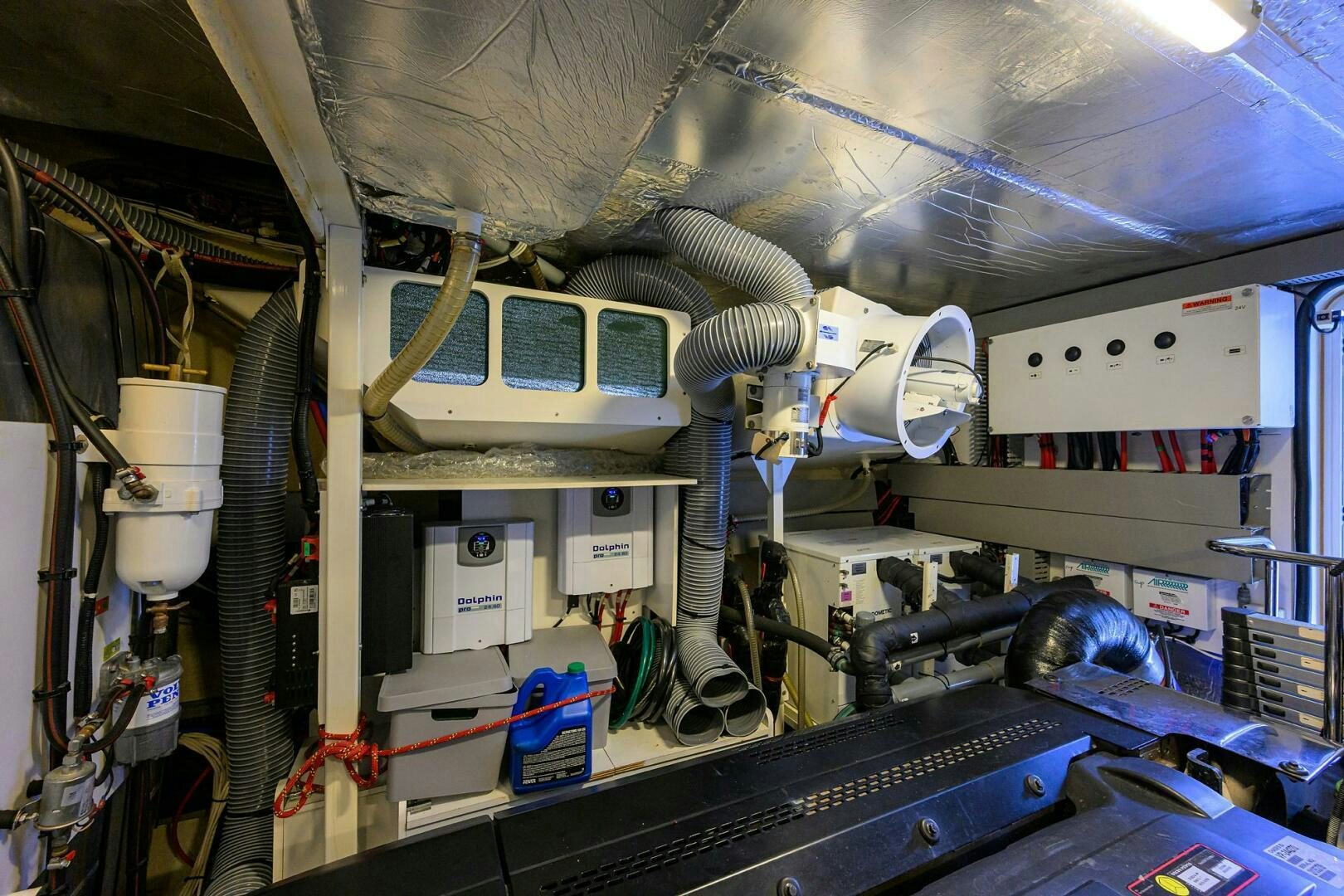 a machine in a room aboard 2016 68 PRESTIGE Yacht for Sale
