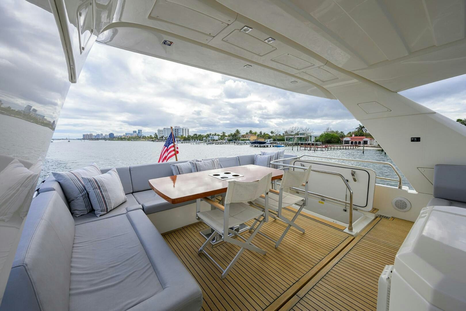 a room with a view of the water and a beach aboard 2016 68 PRESTIGE Yacht for Sale