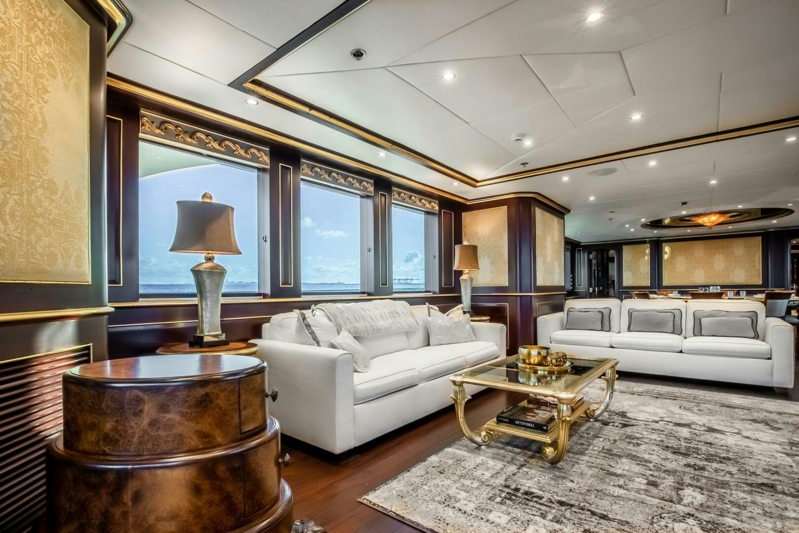 a living room with a large window aboard STATUS QUO Yacht for Sale
