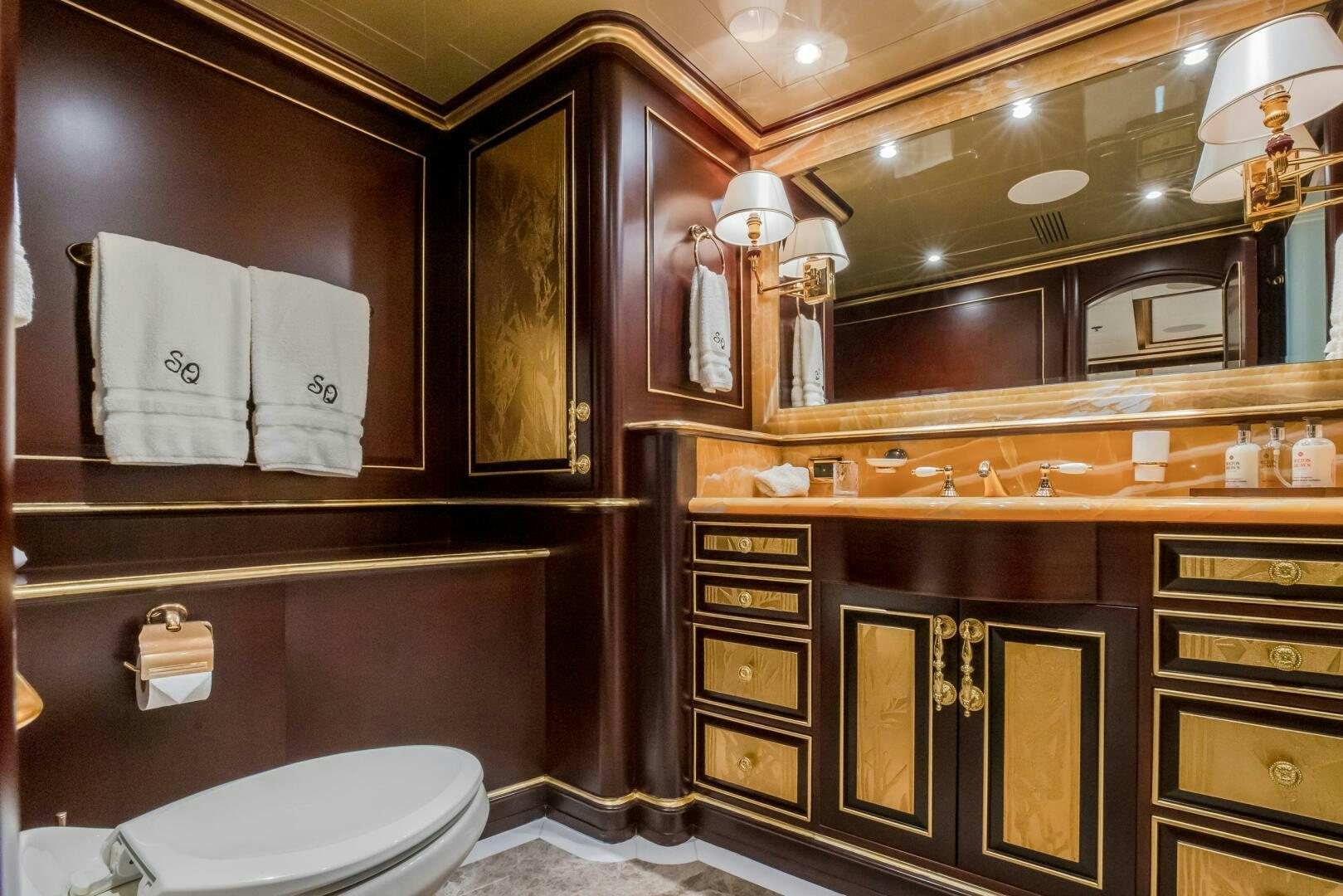 a bathroom with a large mirror aboard STATUS QUO Yacht for Sale