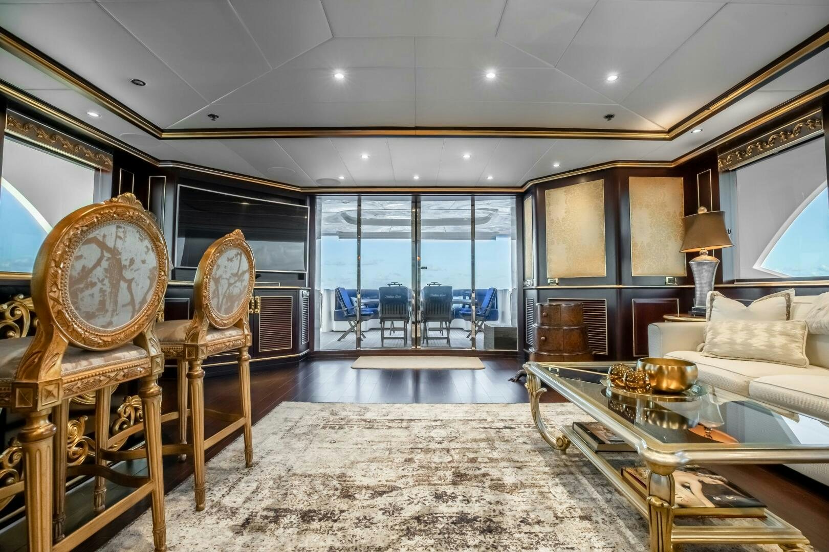a large living room with a large open floor plan aboard STATUS QUO Yacht for Sale