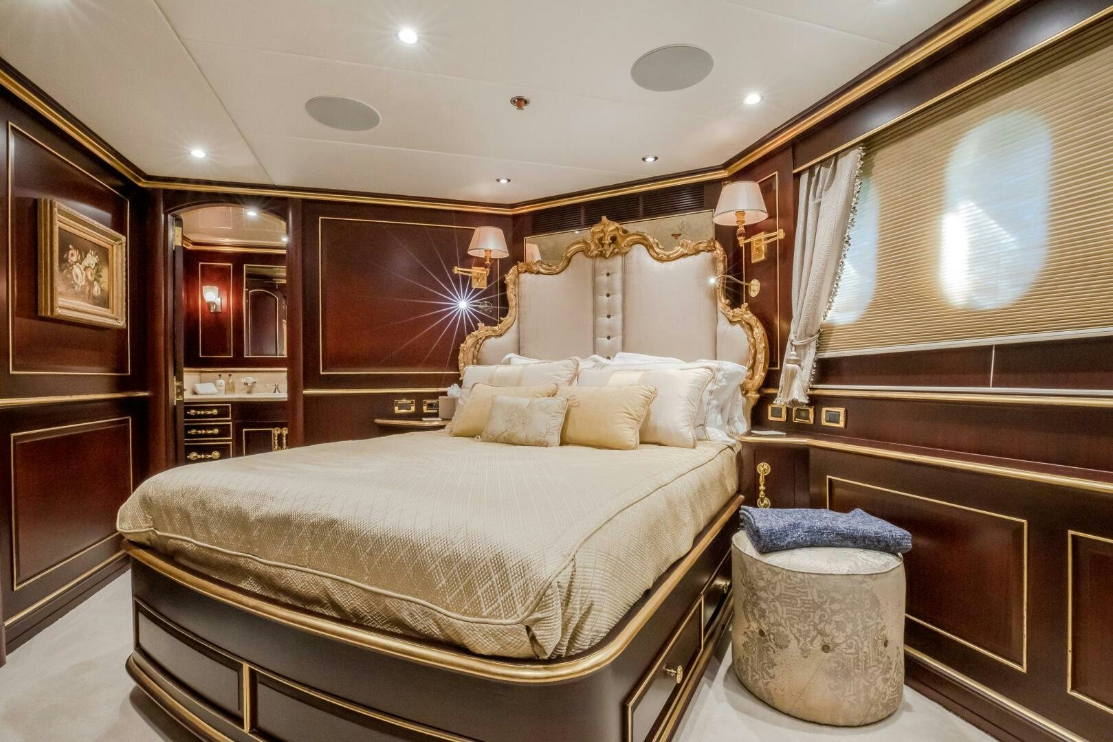 a large bedroom with a large bed aboard STATUS QUO Yacht for Sale
