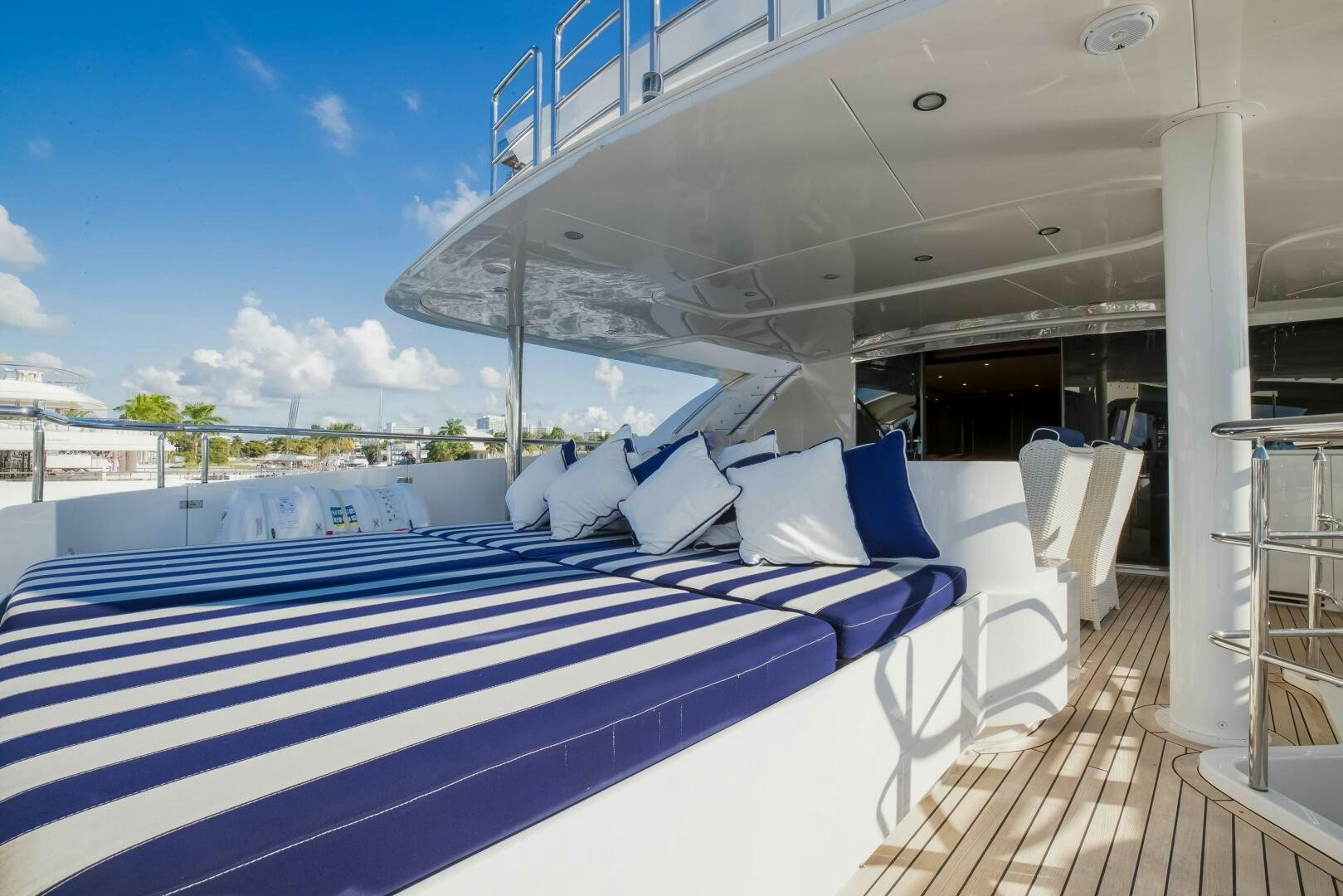a large white boat on a deck aboard STATUS QUO Yacht for Sale