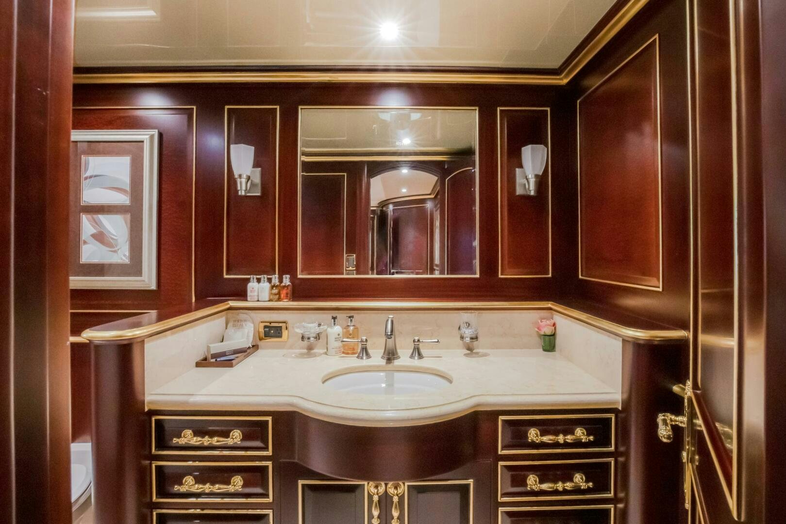 a bathroom with a sink and cabinets aboard STATUS QUO Yacht for Sale