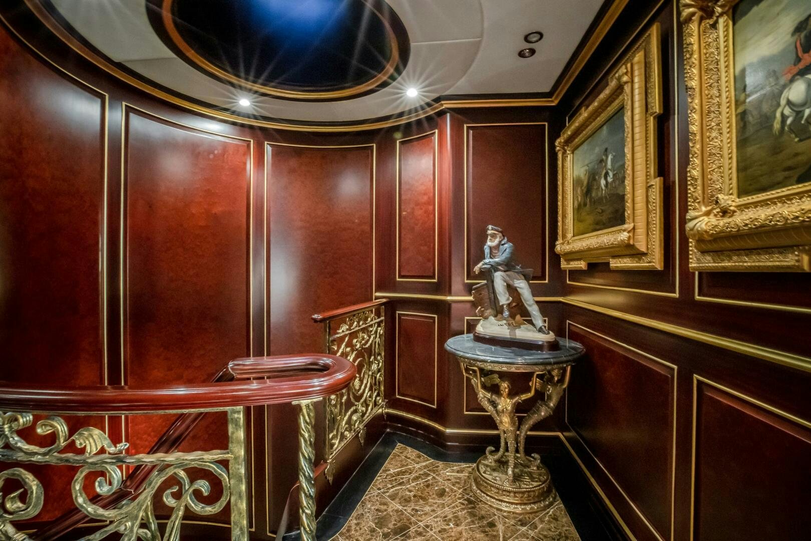 a room with a statue aboard STATUS QUO Yacht for Sale