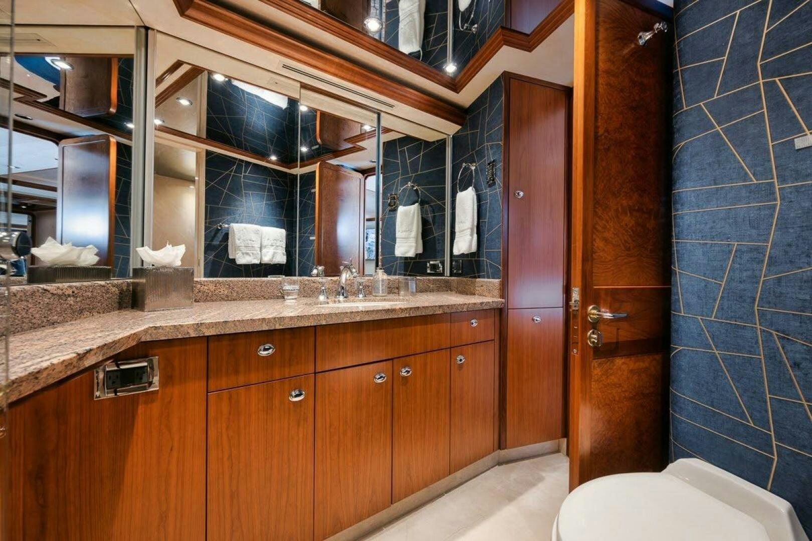 a bathroom with a sink and cabinets aboard SLEEPOVER Yacht for Sale