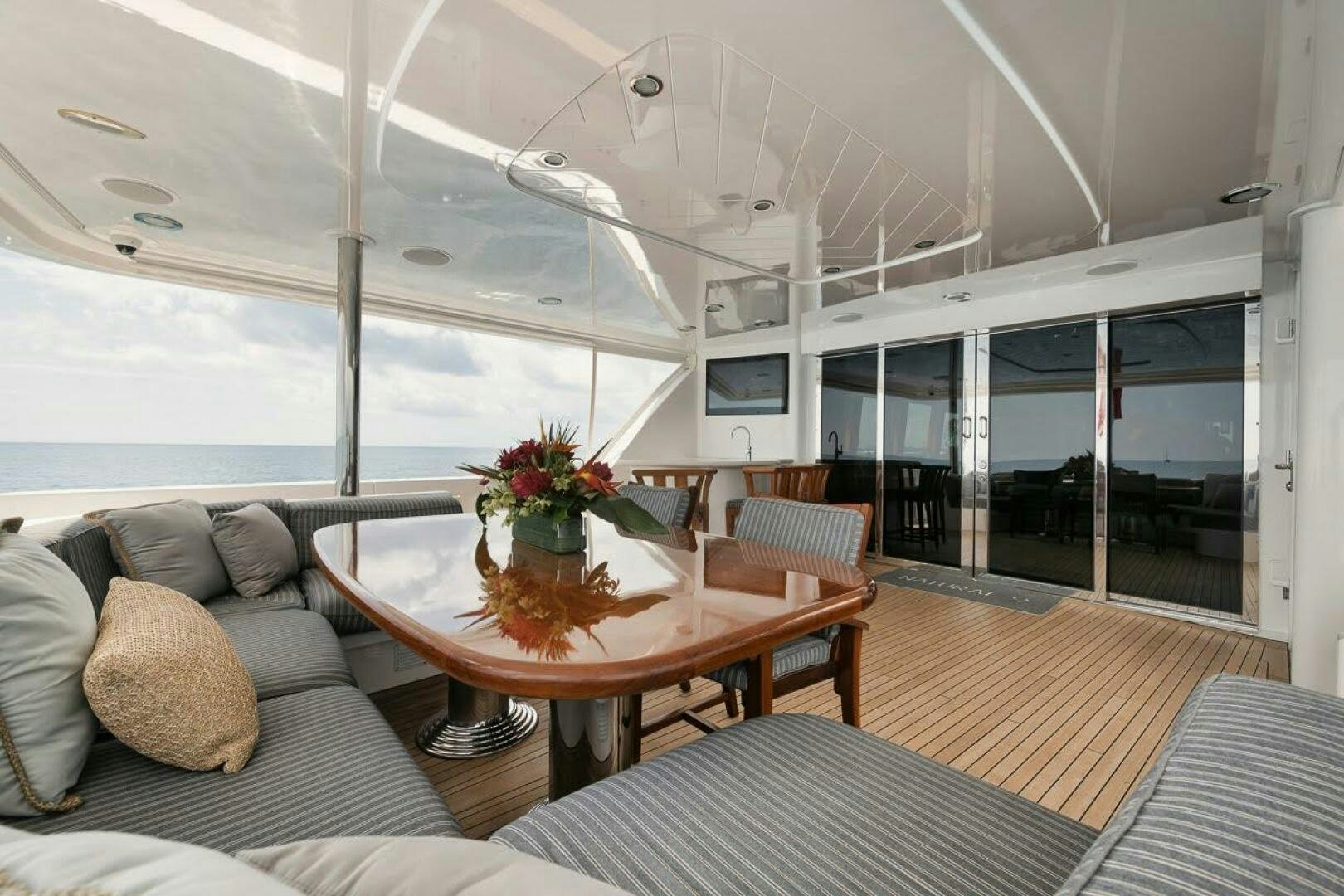 a room with a table and chairs aboard SLEEPOVER Yacht for Sale