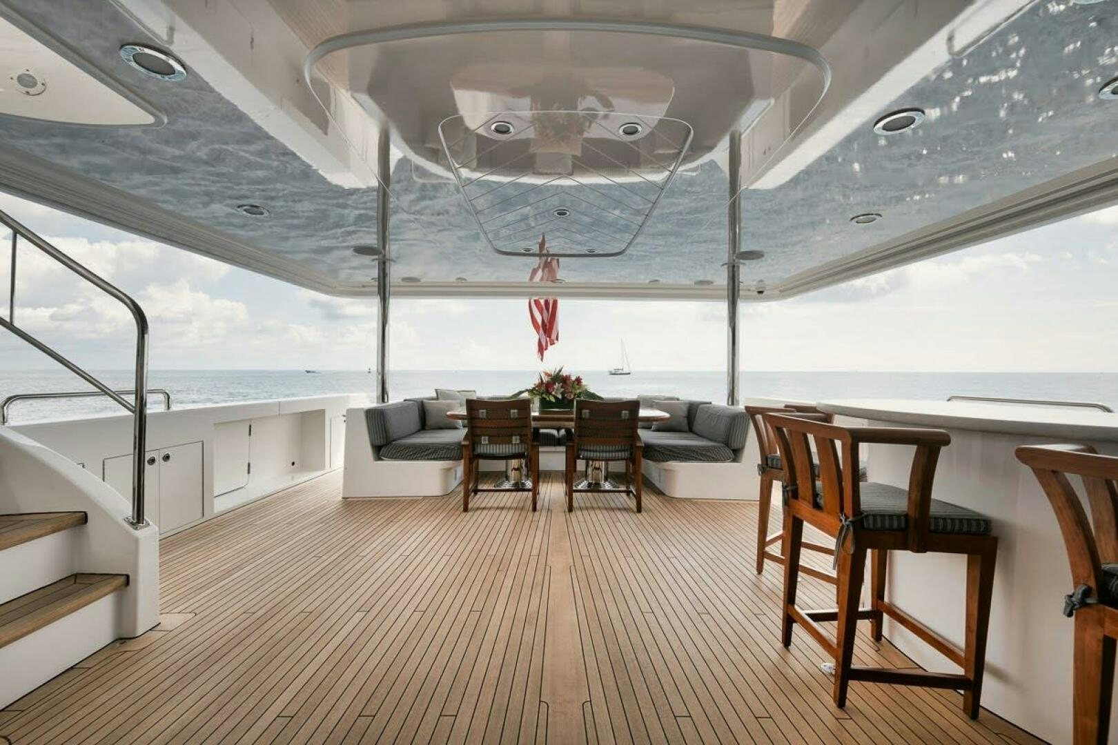 a room with a table and chairs aboard SLEEPOVER Yacht for Sale