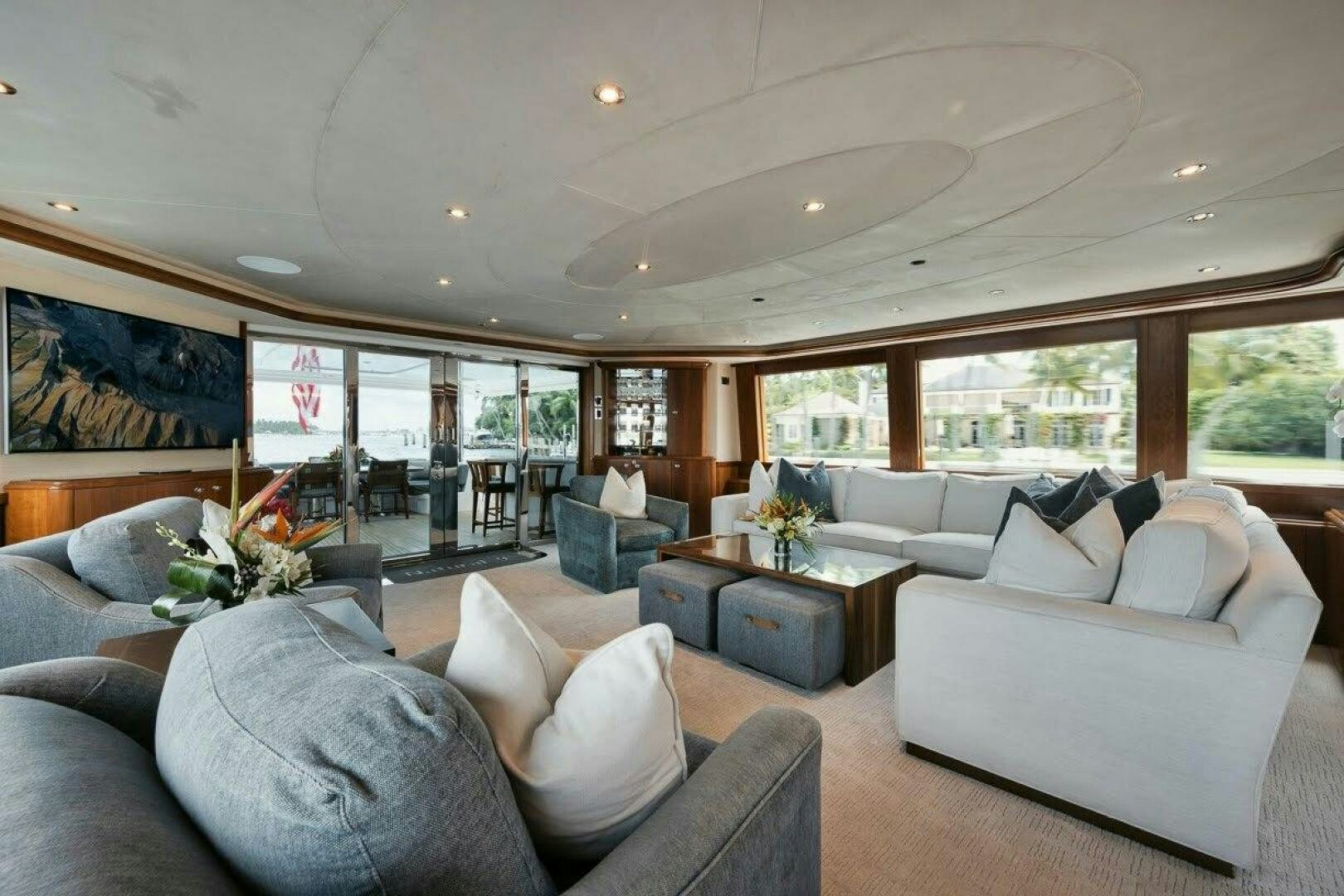a living room with a large window aboard SLEEPOVER Yacht for Sale