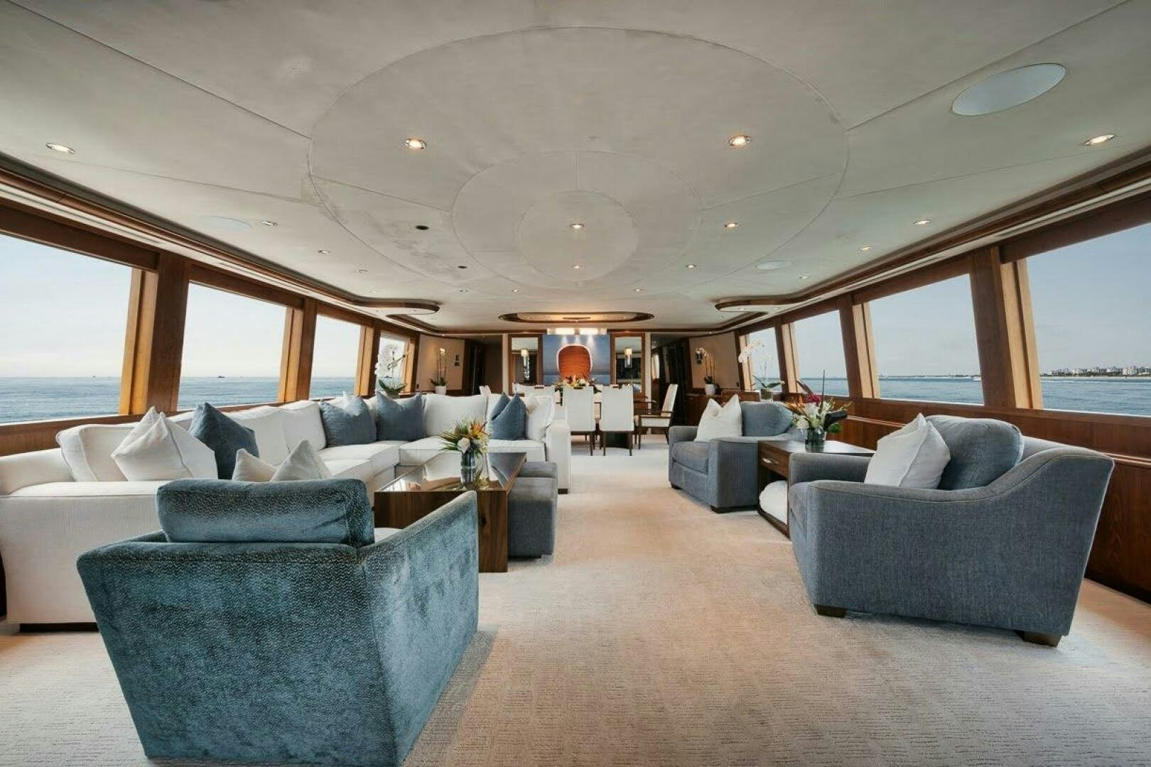 a living room with a large window aboard SLEEPOVER Yacht for Sale