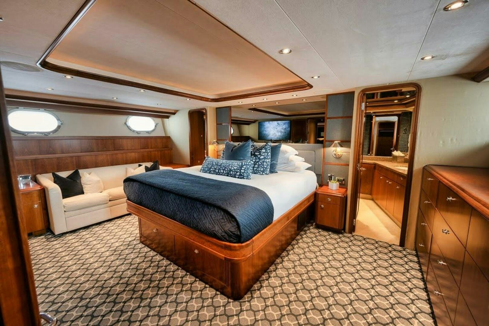 a bed in a room aboard SLEEPOVER Yacht for Sale