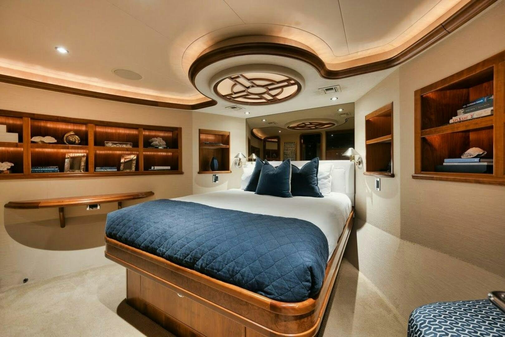 a bedroom with a bed aboard SLEEPOVER Yacht for Sale