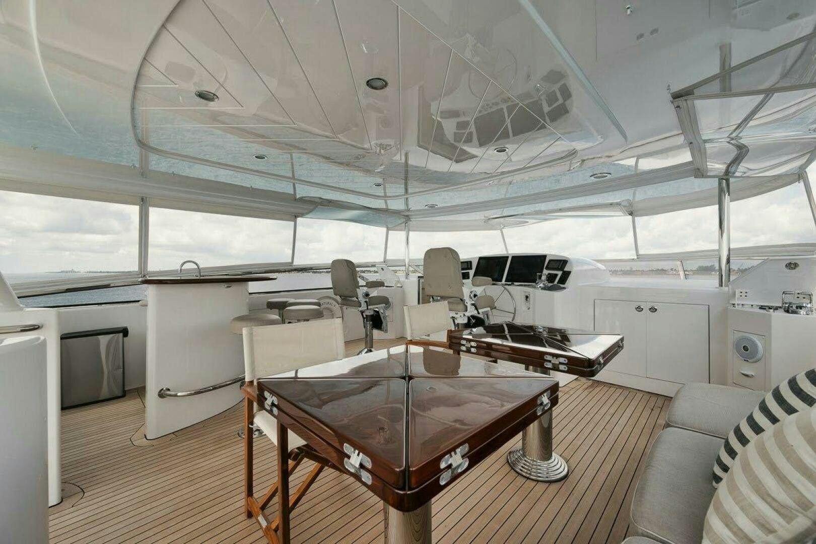 a room with a table and chairs aboard SLEEPOVER Yacht for Sale