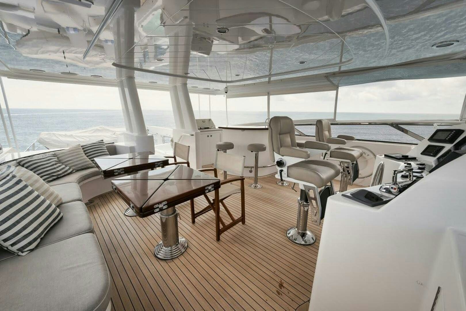 a room with a table and chairs aboard SLEEPOVER Yacht for Sale