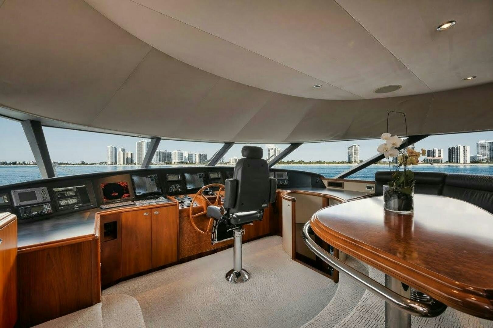 a room with a desk and chairs aboard SLEEPOVER Yacht for Sale