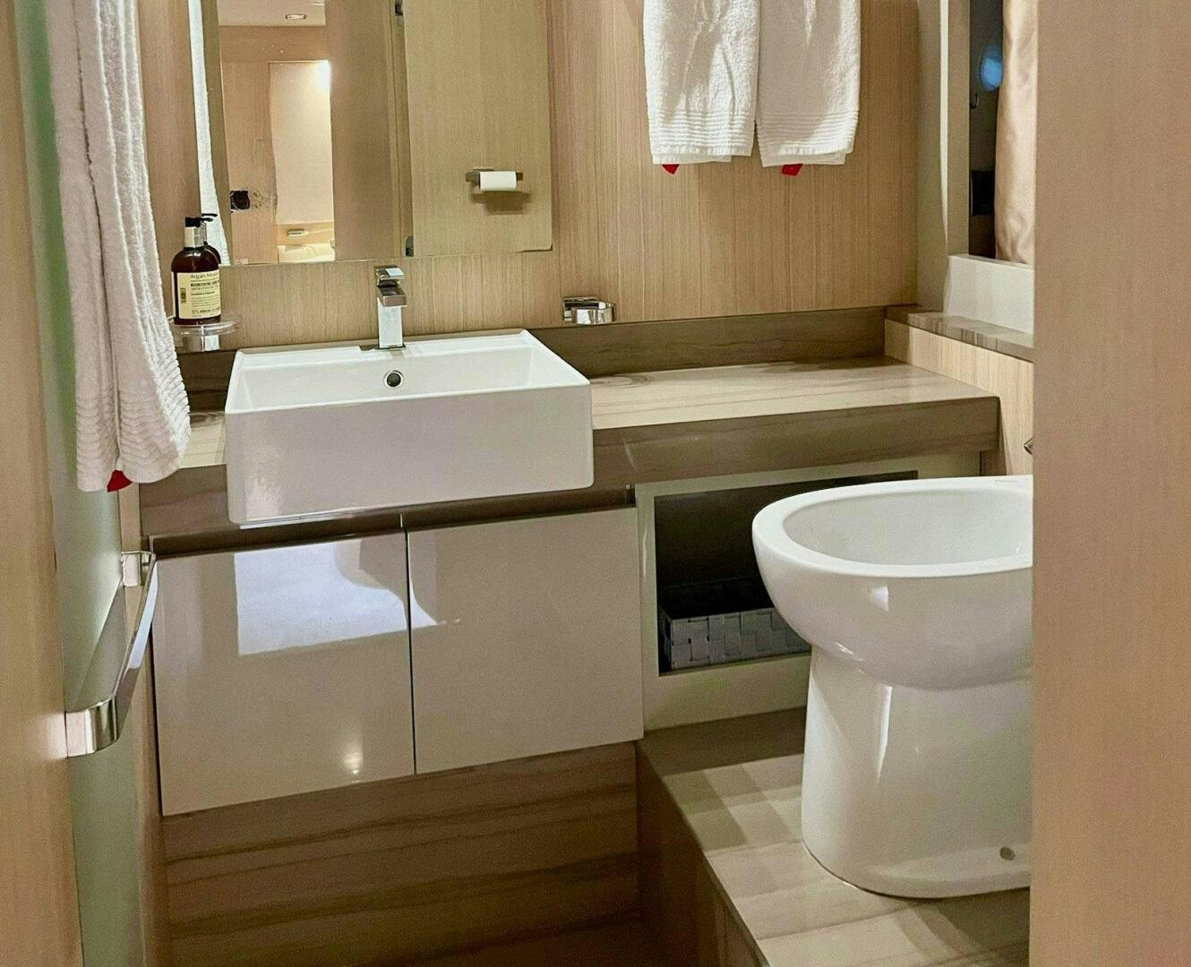 a bathroom with a sink and toilet aboard MISS TER Yacht for Sale