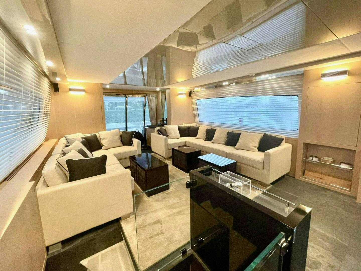 a living room with a couch and a table aboard MISS TER Yacht for Sale