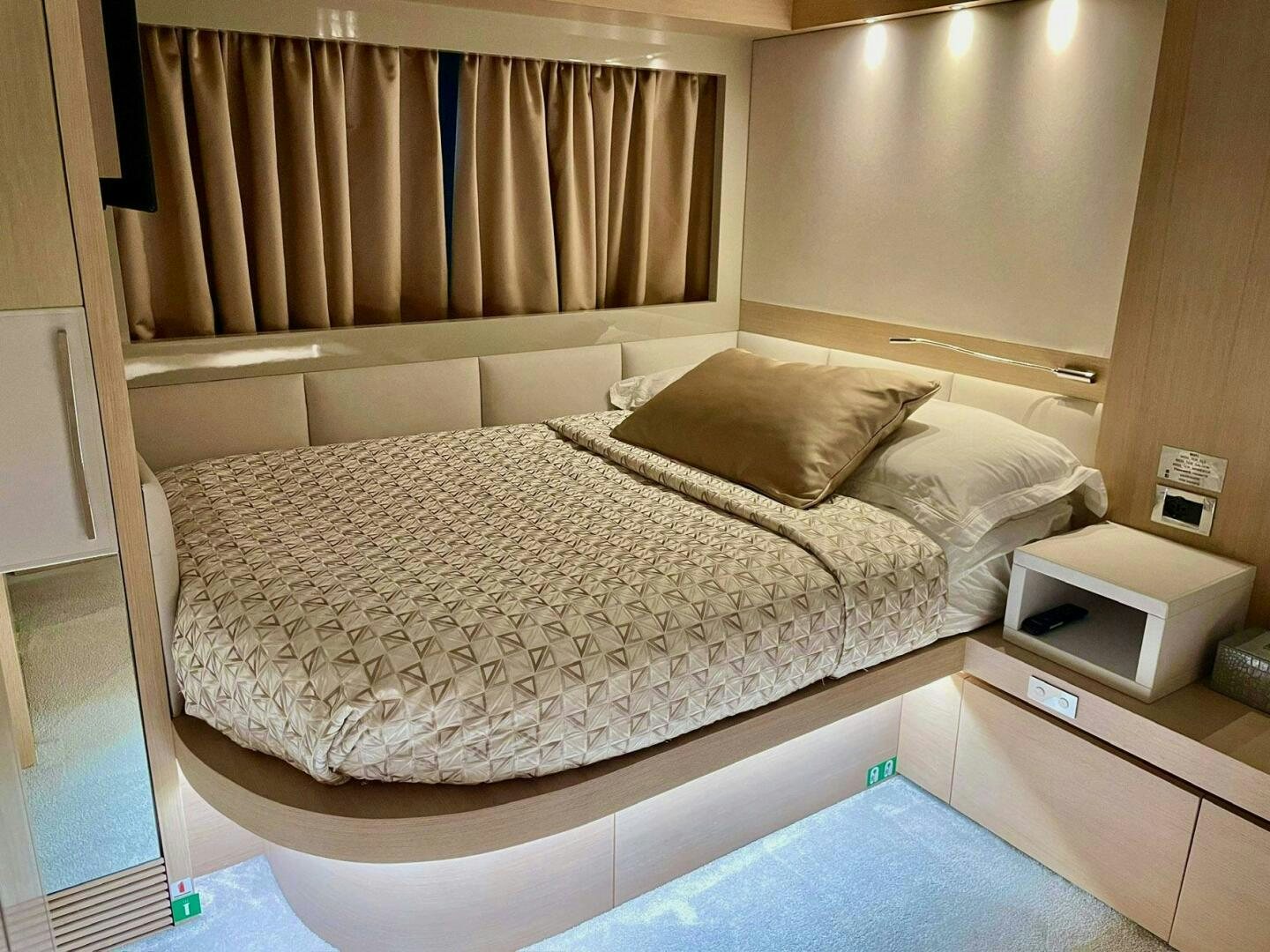 a bed with white sheets aboard MISS TER Yacht for Sale