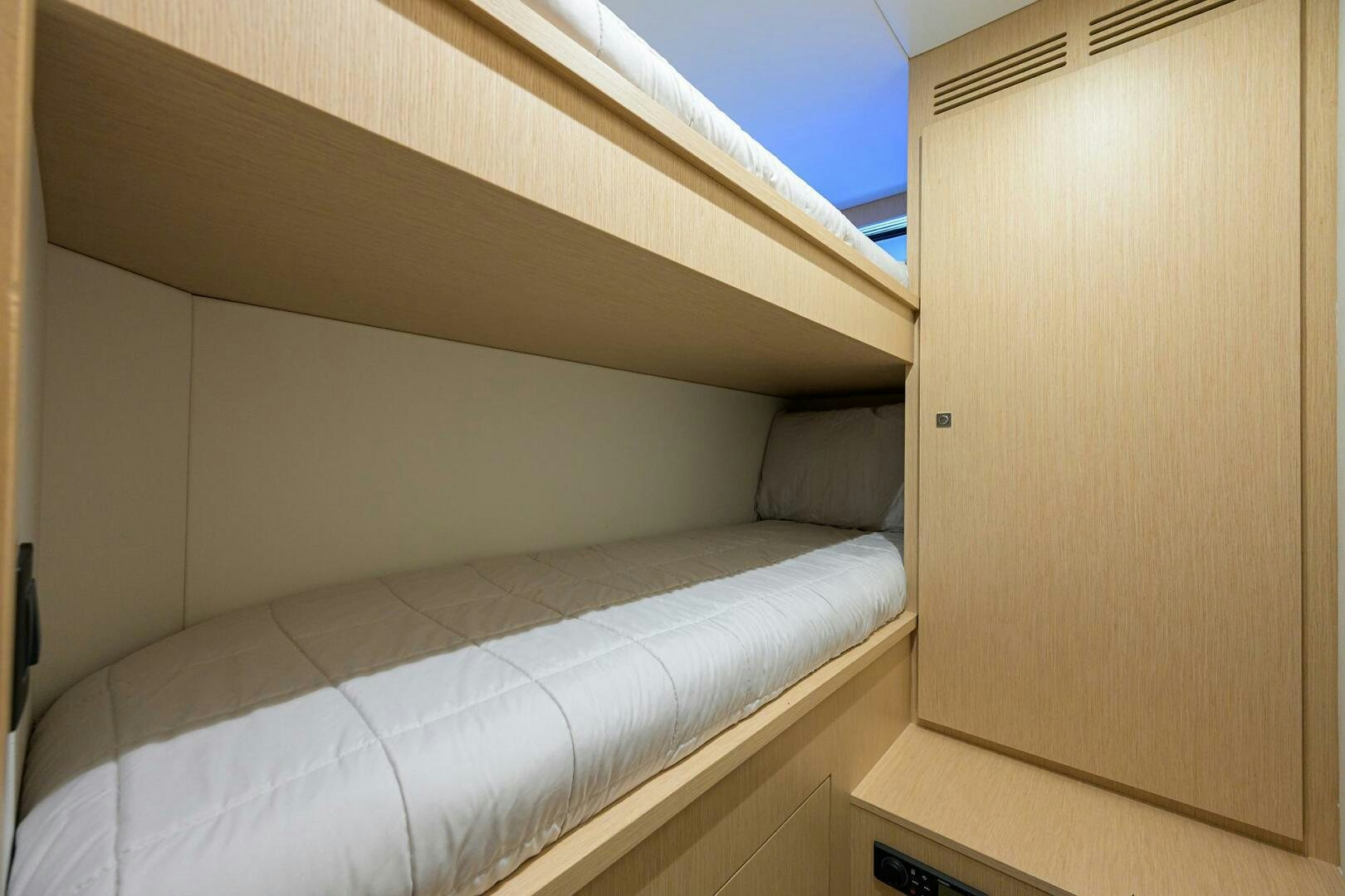 a bed in a room aboard 90 RIVA 2023 Yacht for Sale