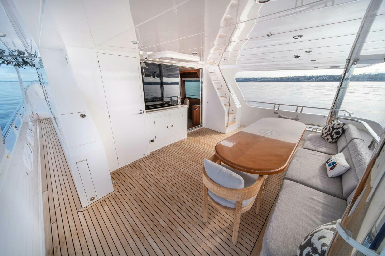 a room with a couch and a table aboard ABRI SUR LA MER Yacht for Sale