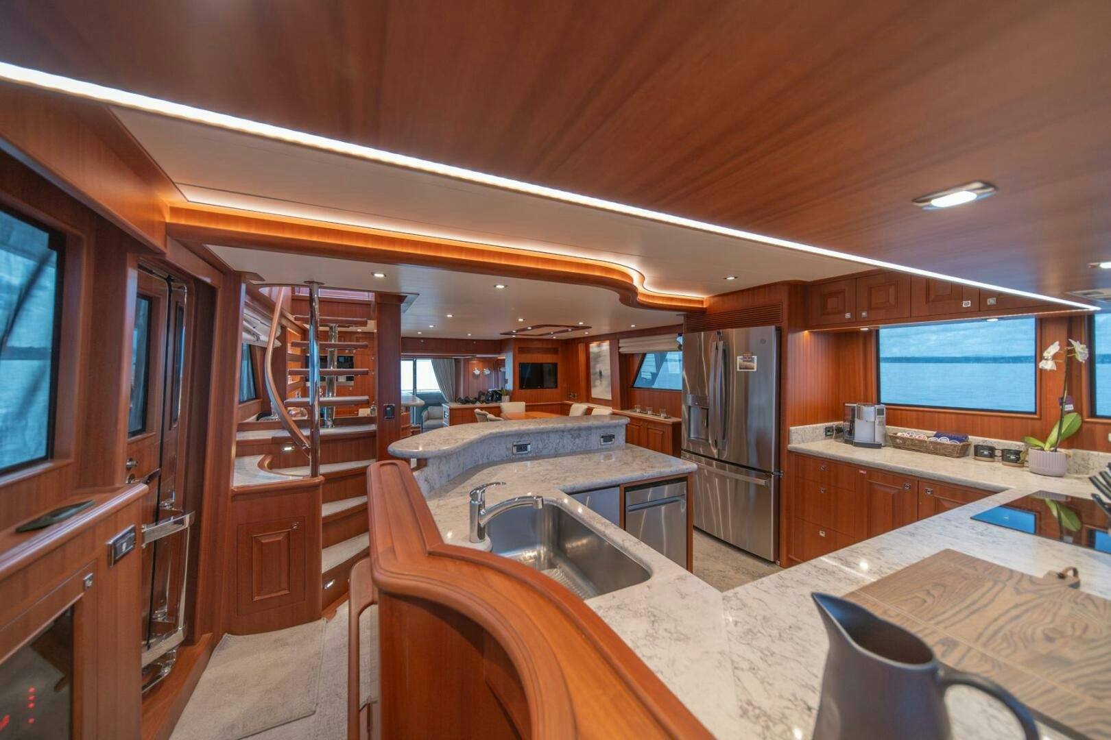 a kitchen with a large island aboard ABRI SUR LA MER Yacht for Sale