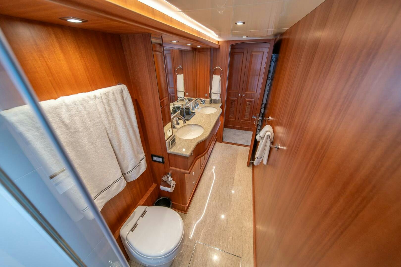 a bathroom with a sink and toilet aboard ABRI SUR LA MER Yacht for Sale