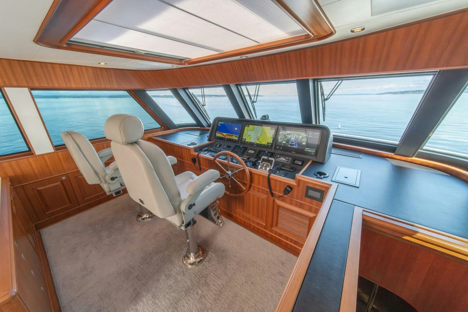 a room with a chair and a desk aboard ABRI SUR LA MER Yacht for Sale