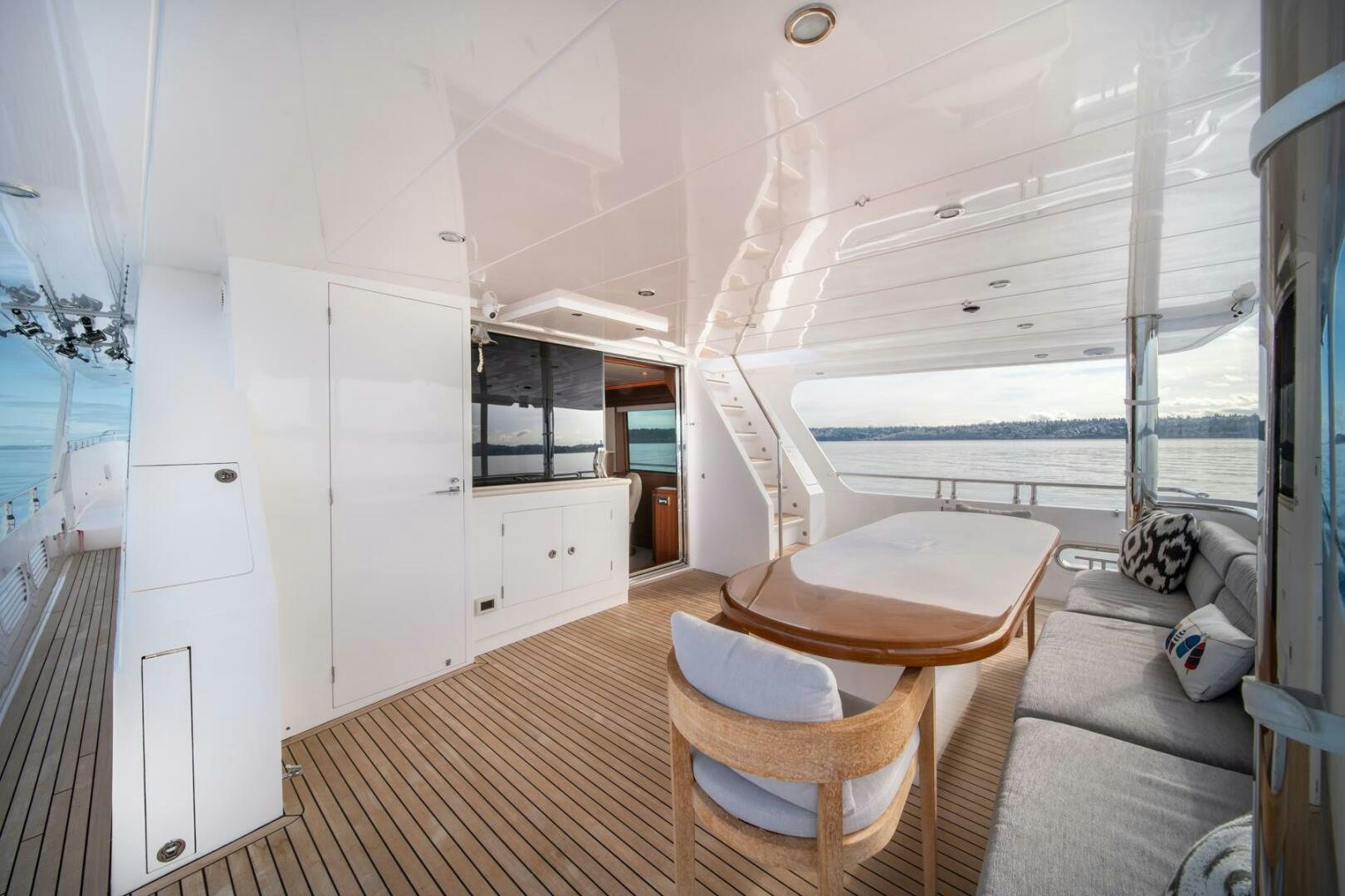 a room with a table and chairs aboard ABRI SUR LA MER Yacht for Sale