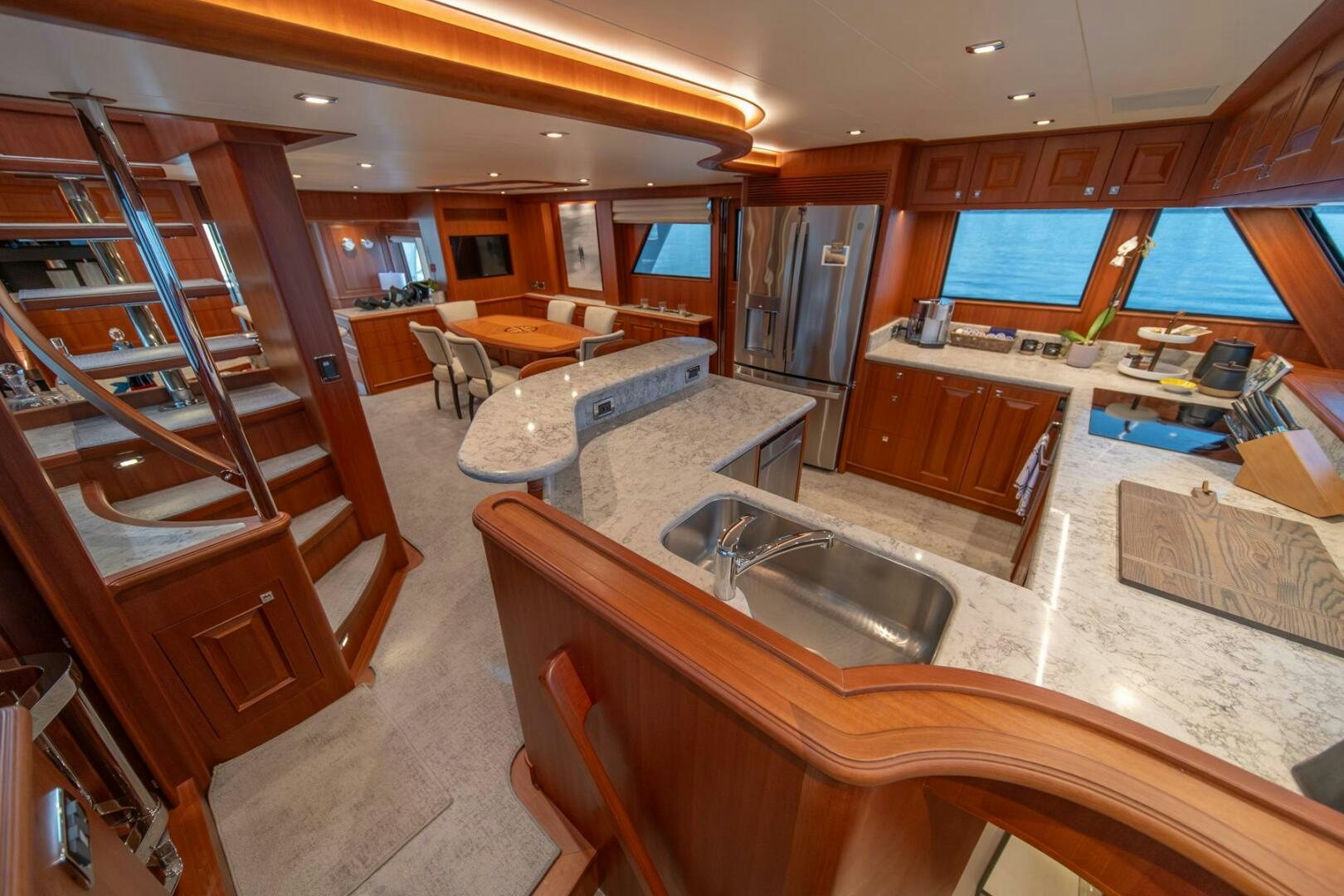 a large kitchen and living room aboard ABRI SUR LA MER Yacht for Sale