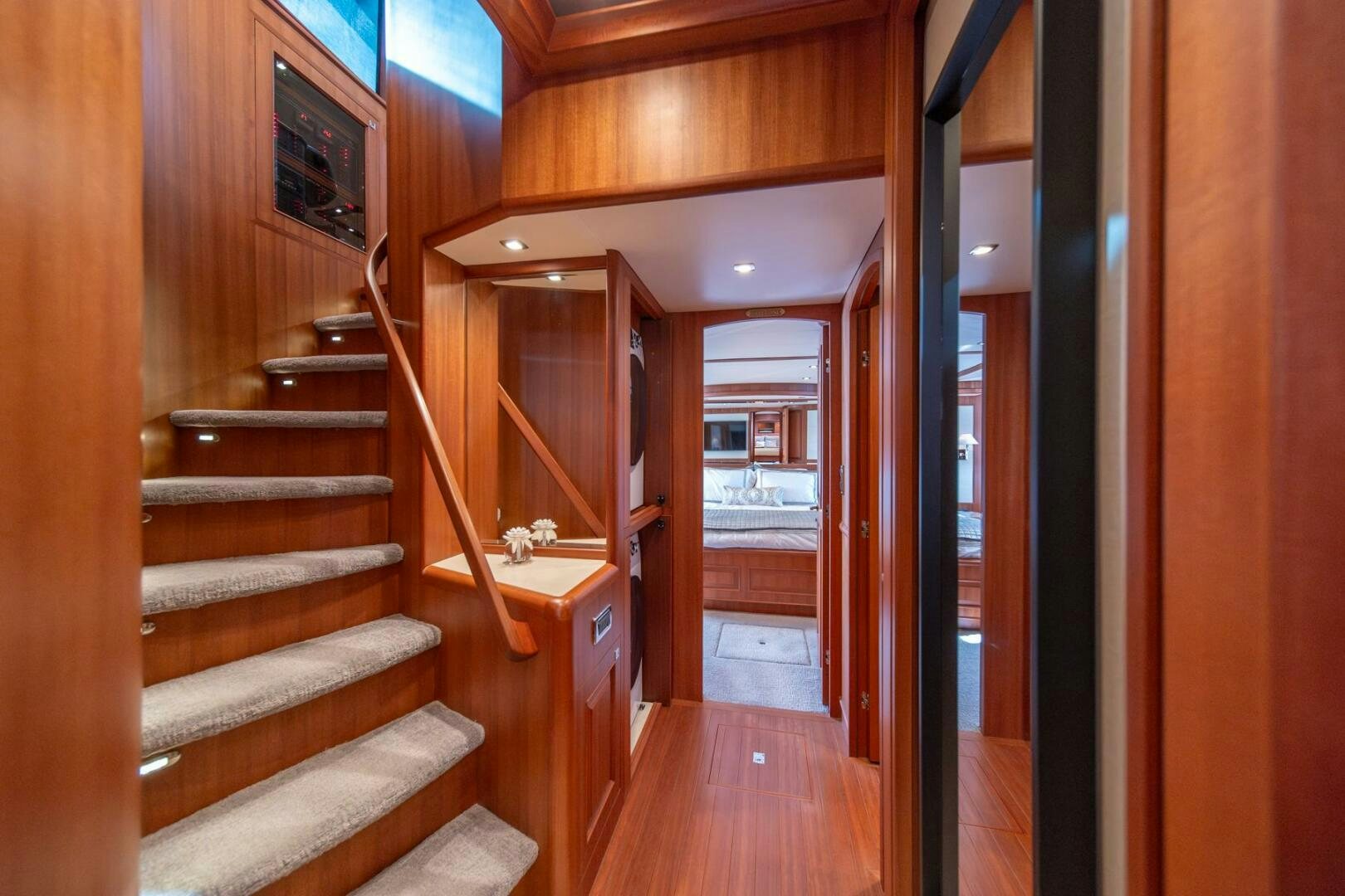 a wooden staircase leading to a room aboard ABRI SUR LA MER Yacht for Sale