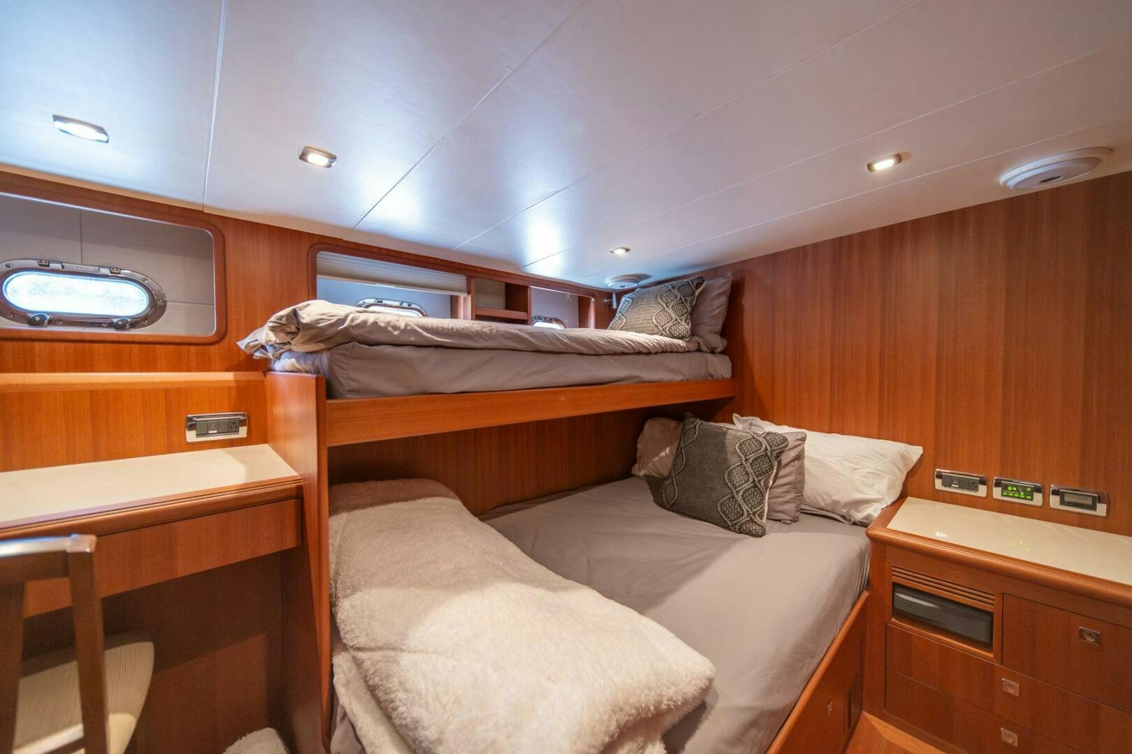 a bed in a room aboard ABRI SUR LA MER Yacht for Sale