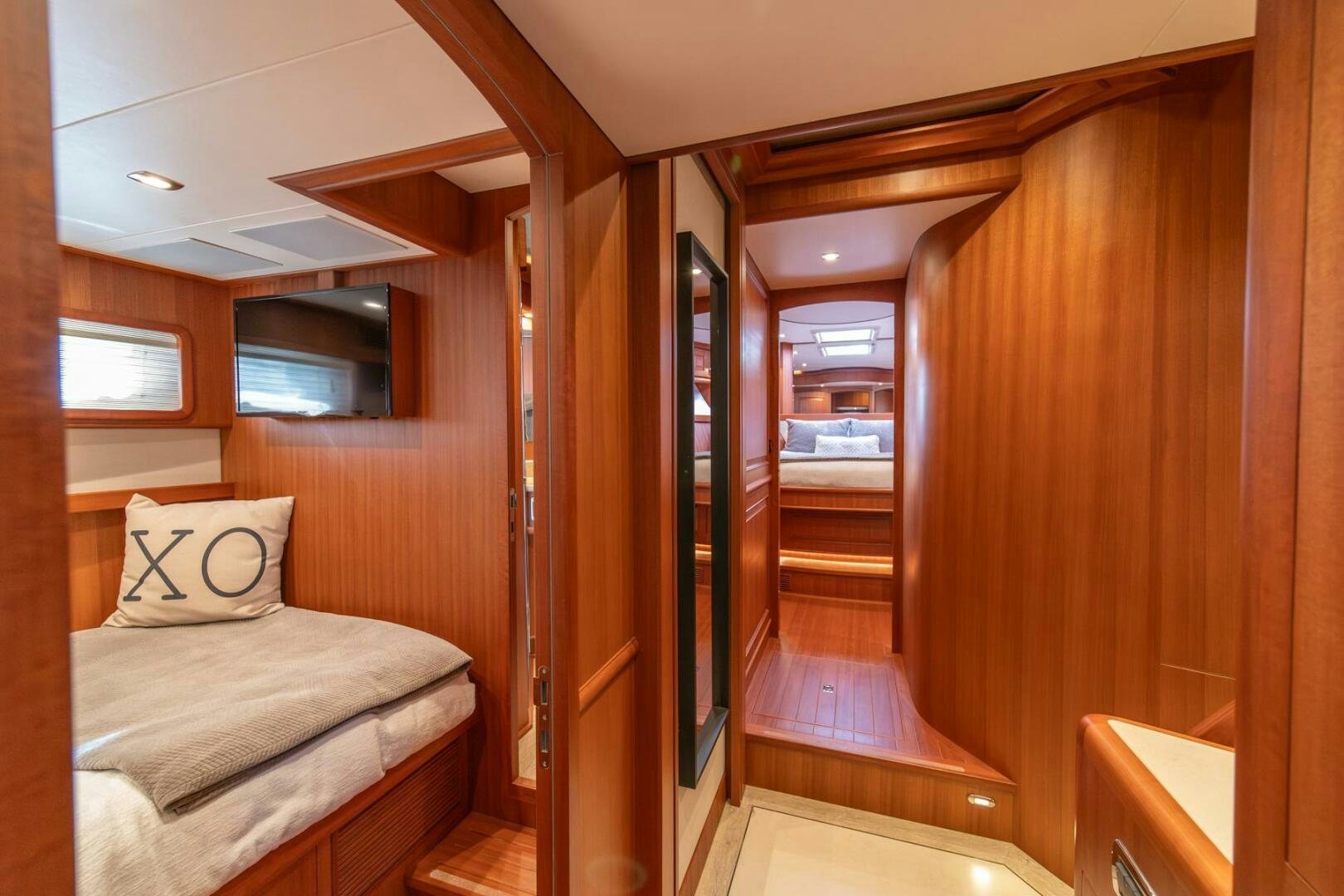 a room with a bed and a door aboard ABRI SUR LA MER Yacht for Sale