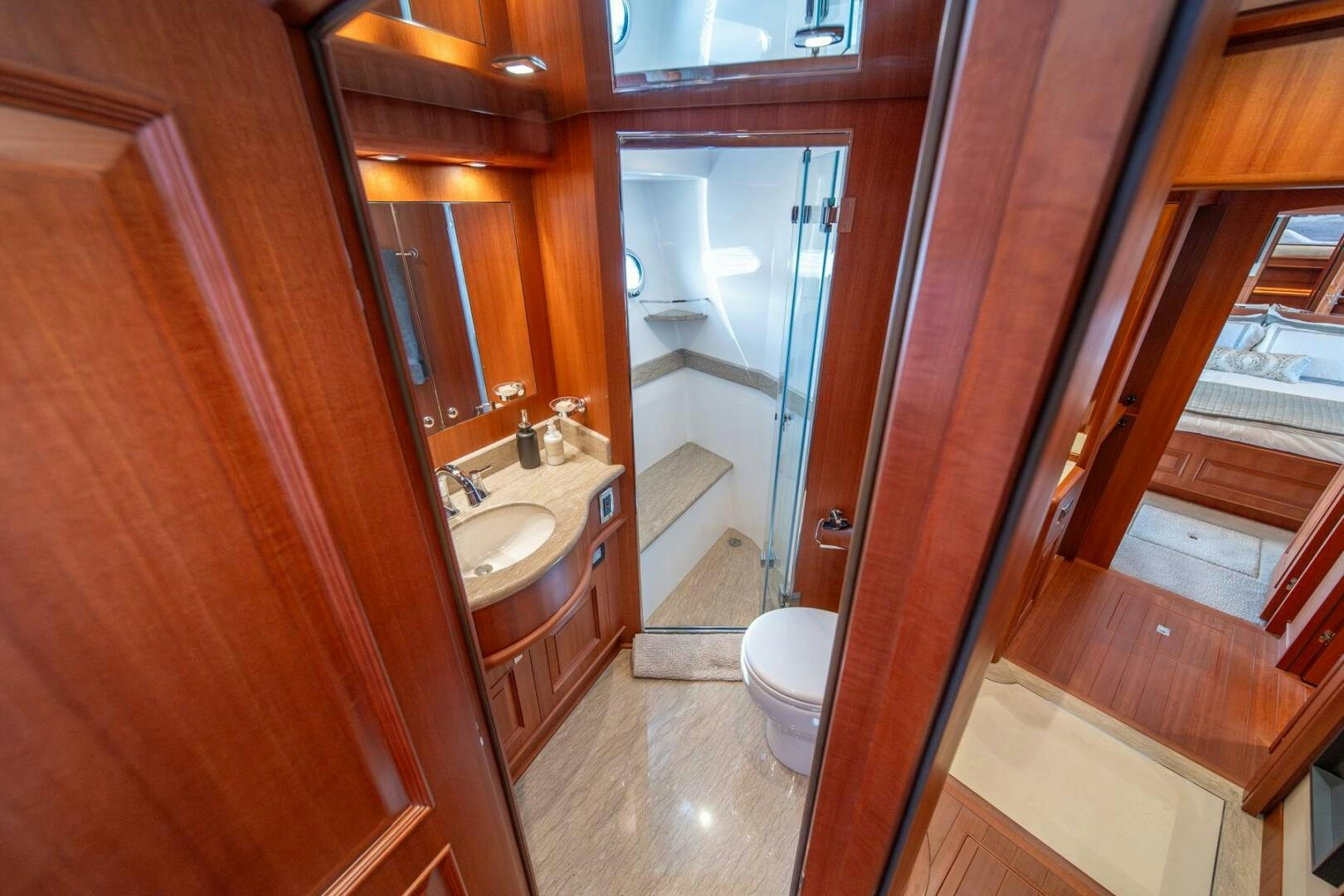 a bathroom with a sink and a toilet aboard ABRI SUR LA MER Yacht for Sale