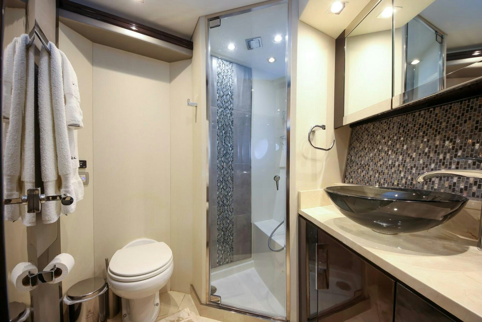 a bathroom with a glass shower aboard PARALOS Yacht for Sale