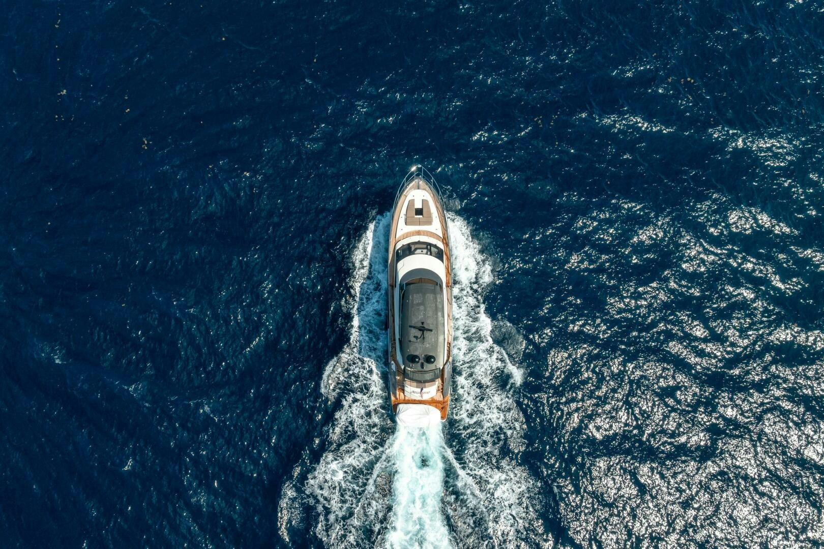 a space shuttle flying over a planet aboard PARALOS Yacht for Sale