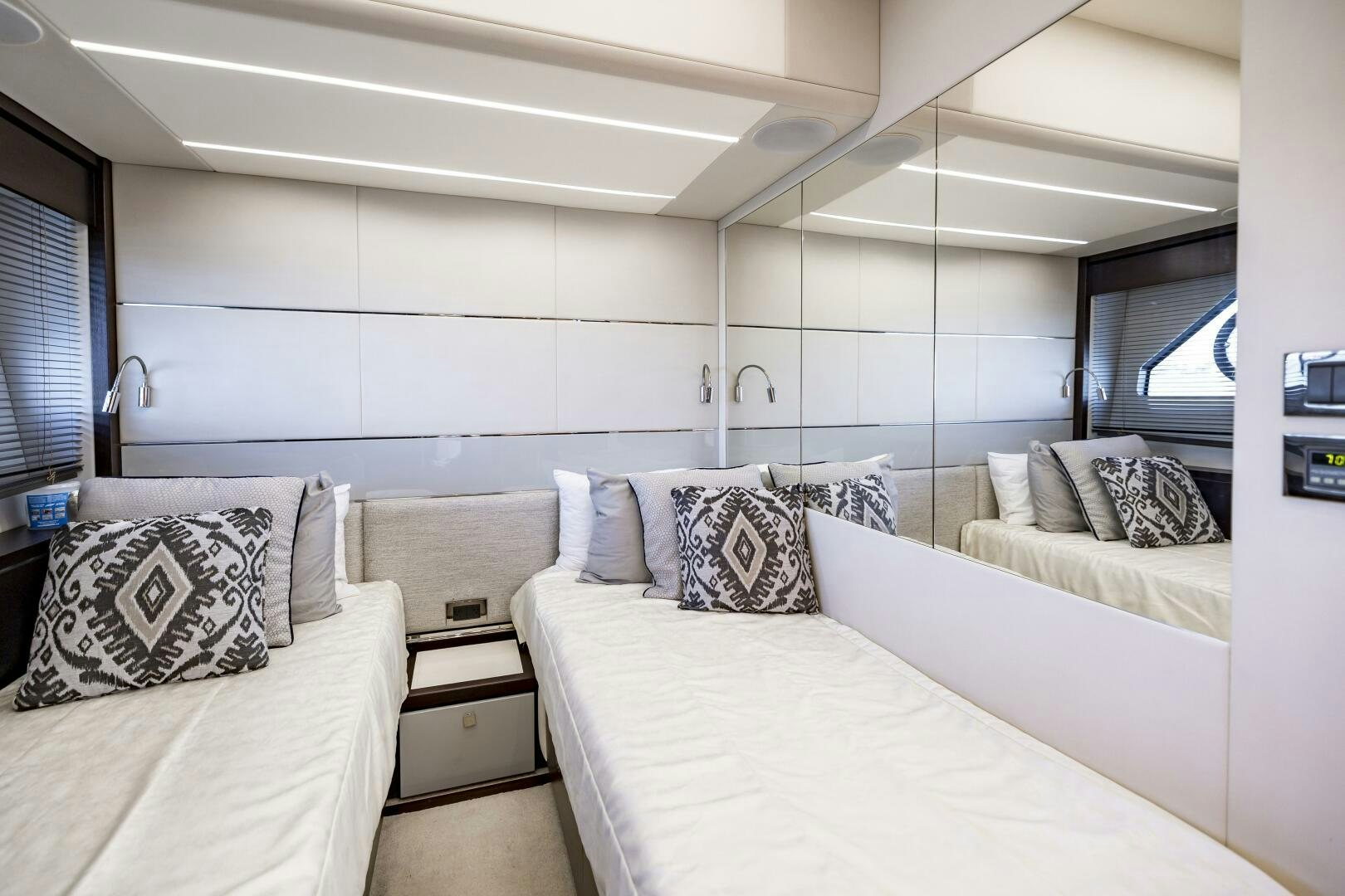 a room with two beds aboard H Yacht for Sale