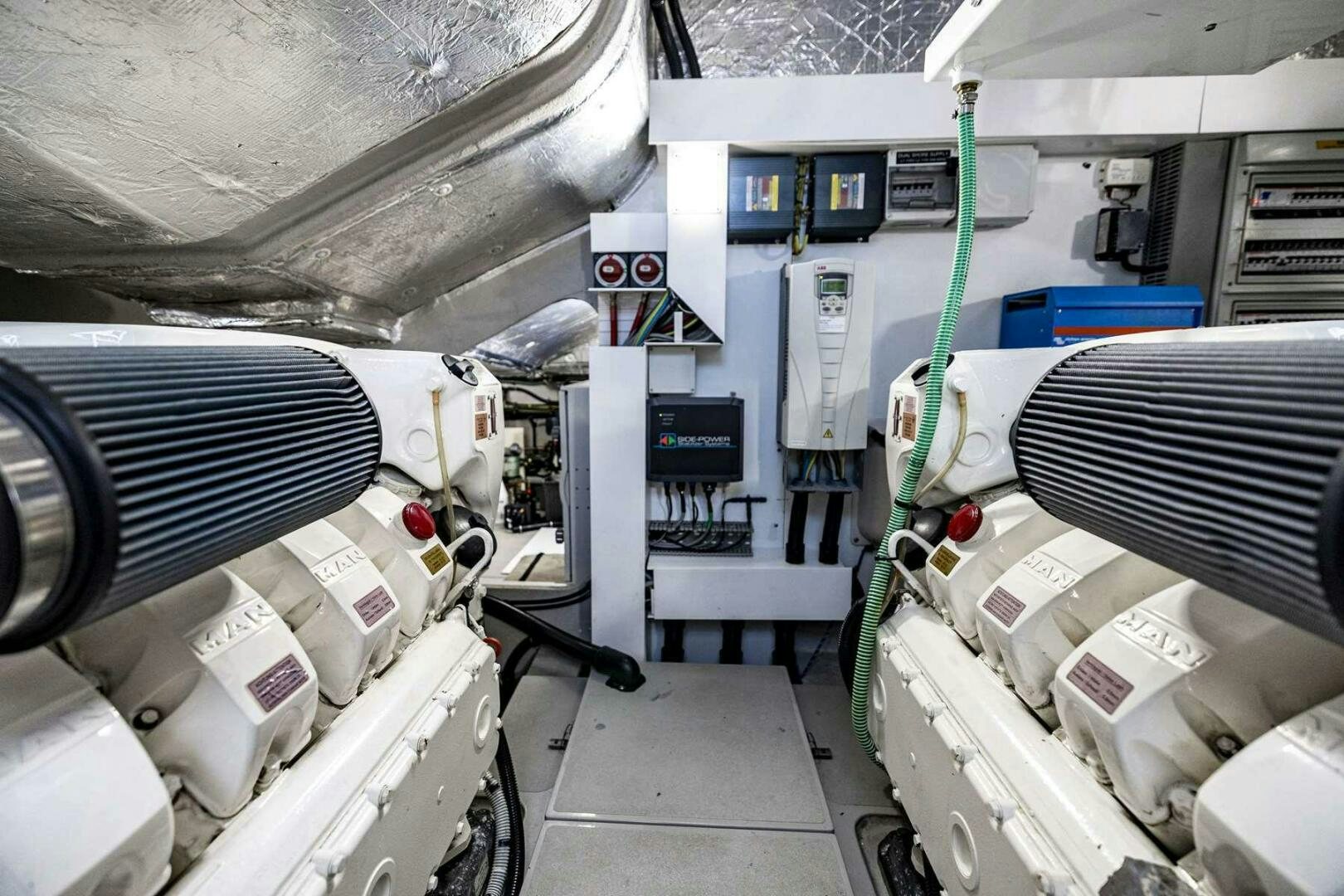 a room with machines and equipment aboard H Yacht for Sale