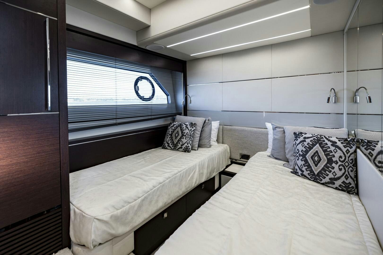 a room with two beds aboard H Yacht for Sale
