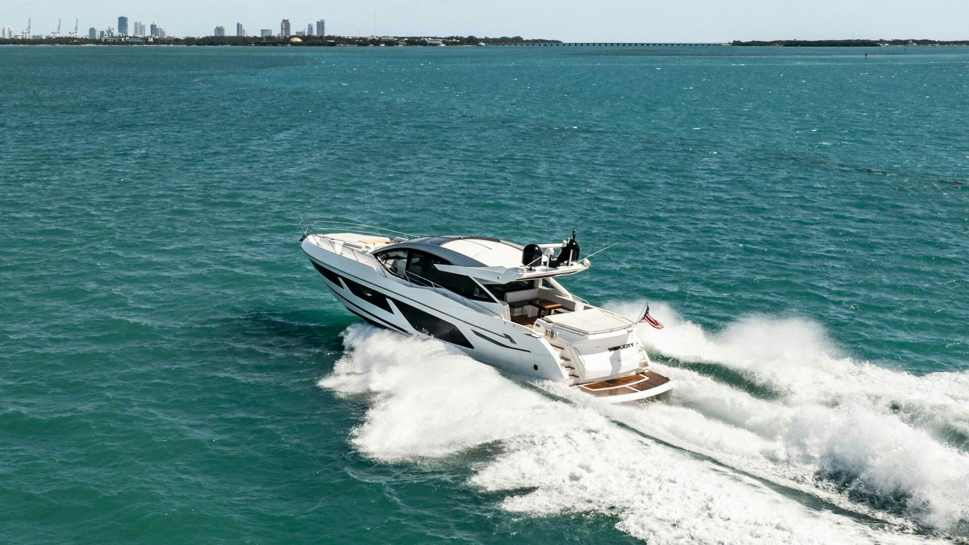 a boat on the water aboard H Yacht for Sale