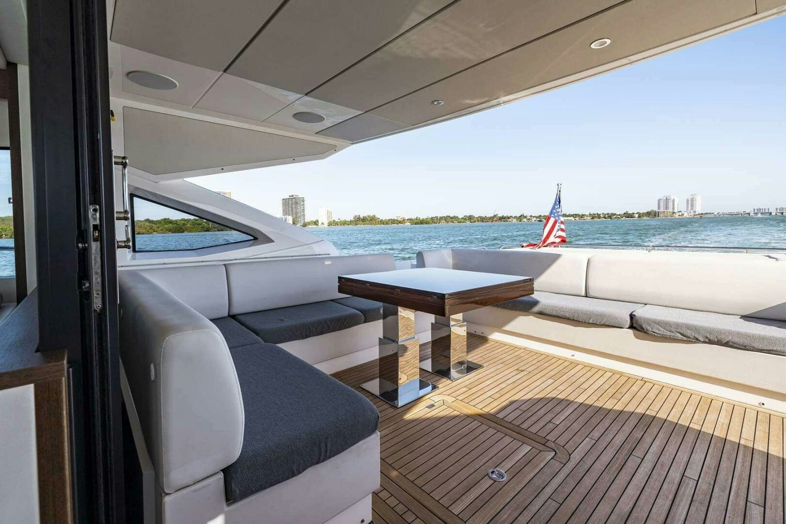 a boat on a deck aboard H Yacht for Sale