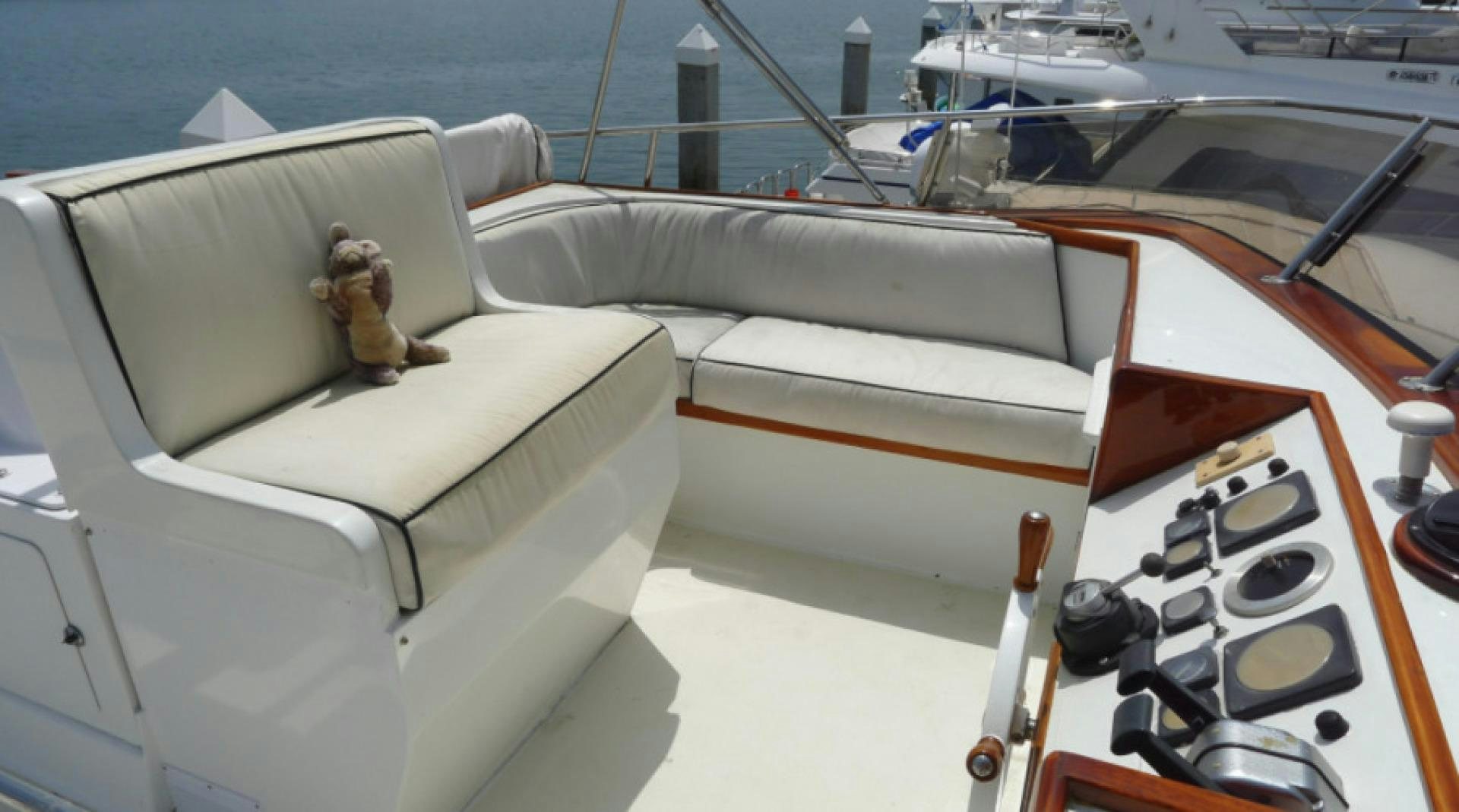 a teddy bear on a boat aboard DAKOTA Yacht for Sale