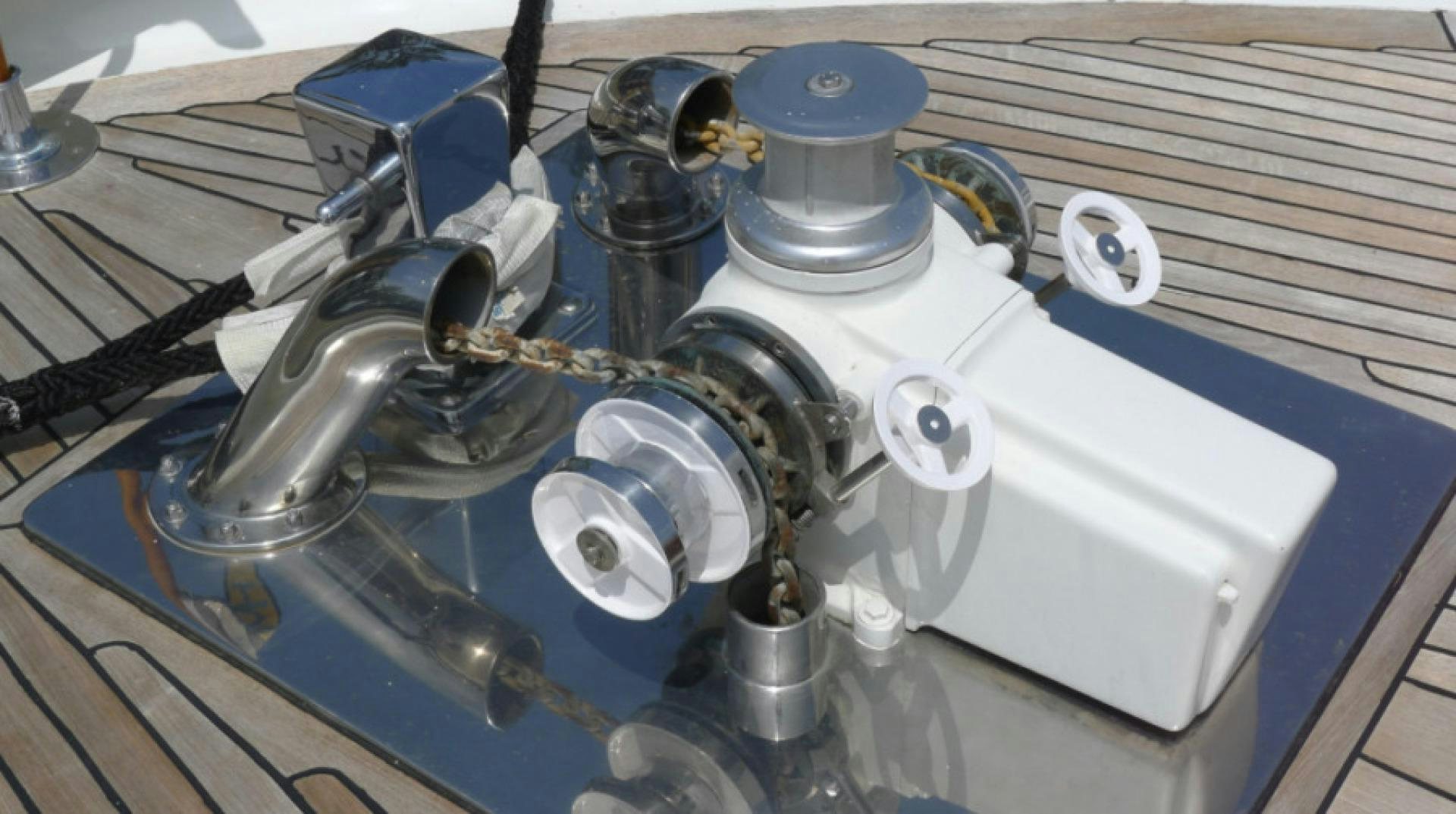 a machine with a large metal cylinder aboard DAKOTA Yacht for Sale